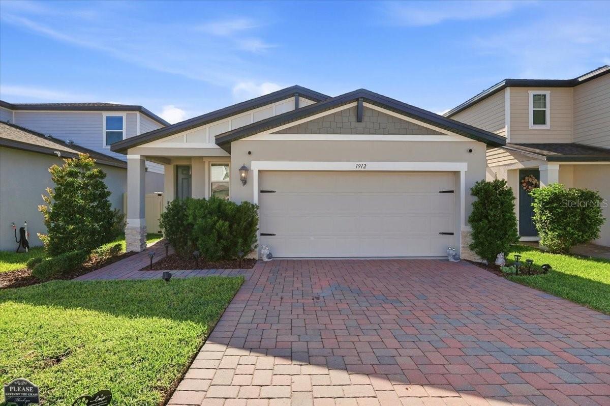 Short Sale. This home is located in Villamar Subdivision in Southeast Winter Haven. It was built in 2022, and it features a nice open concept with split bedroom plan, inside laundry room, and an open kitchen with a large island. The home has ceramic tile and wood flooring throughout for ease of living. The kitchen features stainless steel appliances package with granite countertops. Other features of this home include a two-car garage, vinyl fencing, and beautiful landscaping. The community features a community pool and playground to enjoy!