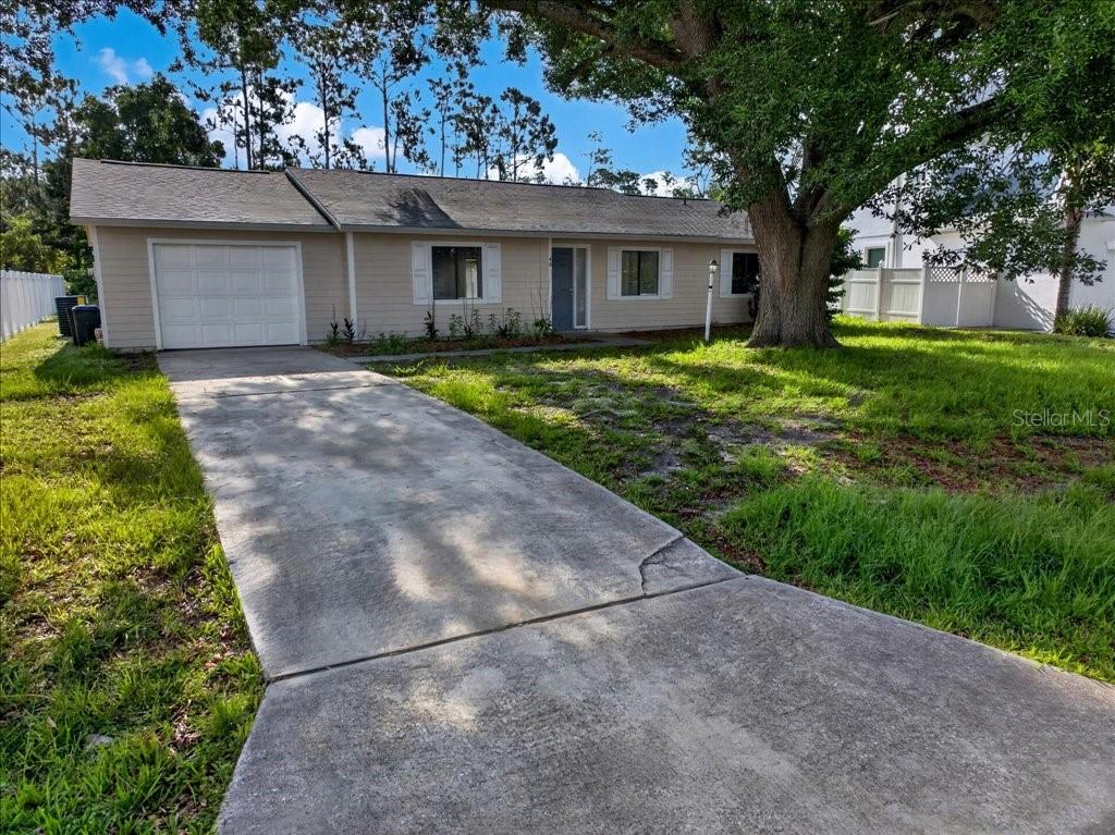 SELLER WANTS THIS SOLD!  BRING OFFERS  Welcome to your beautifully updated new home! This stunning property sits on a huge, 12,000-square-foot lot, giving you plenty of space for outdoor fun, gardening, or adding a pool. Every inch of this house has been completely remodeled, so it feels brand new inside.

Step into the kitchen and you will find gorgeous new stone countertops and bright new cabinets that have tons of storage. The entire home features fresh updates that make everyday living comfortable and stylish.

Best of all, you can move in with total peace of mind. The house comes with a brand-new HVAC system to keep you cool all summer long, and the roof was recently replaced. Located in a wonderful neighborhood, 40 Boulder Rock Drive is completely turn-key and ready for you to enjoy. Don't miss out on this amazing home!