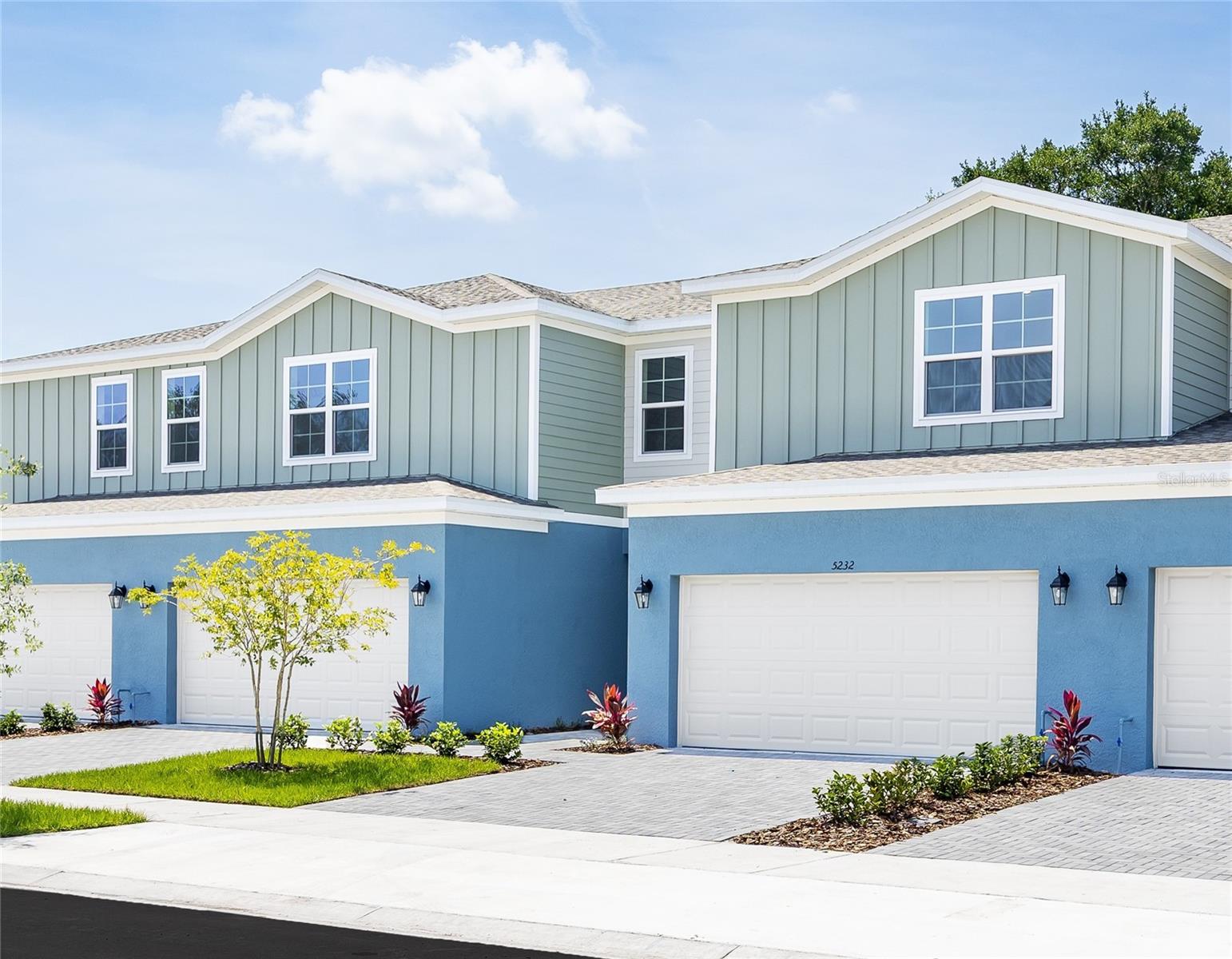 Summer Move-In! Estimated Completion: July 2026. Just minutes from Lake Nona, without the Lake Nona price tag! Welcome to The Hazel, a thoughtfully designed four-bedroom townhome with a two-car garage, delivering the space, comfort, and livability of a single-family home in Terra Haven, a new low-maintenance community ideally located near Lake Nona, Medical City, Orlando International Airport, SR-417, and Florida’s Turnpike. This versatile floor plan features 4 bedrooms plus a spacious loft, perfect for a home office, media room, or play area. The open-concept main living space is enhanced by 9’4” first-floor ceilings, an 8’ front entry door, and tile flooring throughout the first floor, creating a bright, airy atmosphere designed for modern living. An attached two-car garage adds everyday convenience and storage. The gourmet kitchen is both stylish and functional, showcasing 42" Brooklyn cabinets, stainless steel appliances, quartz countertops, an oversized center island, and a walk-in pantry. Triple sliding glass doors lead to a 24’ wide covered lanai, extending your living space outdoors and overlooking a private backyard framed by lush trees, perfect for morning coffee or evening relaxation. Additional features include a paver driveway and lead walk, energy-efficient construction, lawn care included, low HOA dues, and NO CDD fees, allowing you to enjoy a low-maintenance lifestyle without compromising on quality or location. Located in St. Cloud just outside the Lake Nona core, Terra Haven provides convenient access to top-rated schools, parks, lakes, trails, shopping, dining, and major highways, while offering a quieter, more relaxed setting to call home. Thoughtful design. Modern finishes. Exceptional value. Ask about our incentives! Schedule your private tour today—this home’s location within the community makes it a standout opportunity. Hablamos Español. DISCLAIMER: Photos and/or drawings of homes may show upgraded landscaping, elevations and optional features that may not represent the lowest priced homes in the community. Pricing, Incentives and Promotions are subject to change at anytime. Promotions cannot be combined with any other offer. Ask the Sales and Marketing Representative for details on promotions. Actual home may differ from photos.