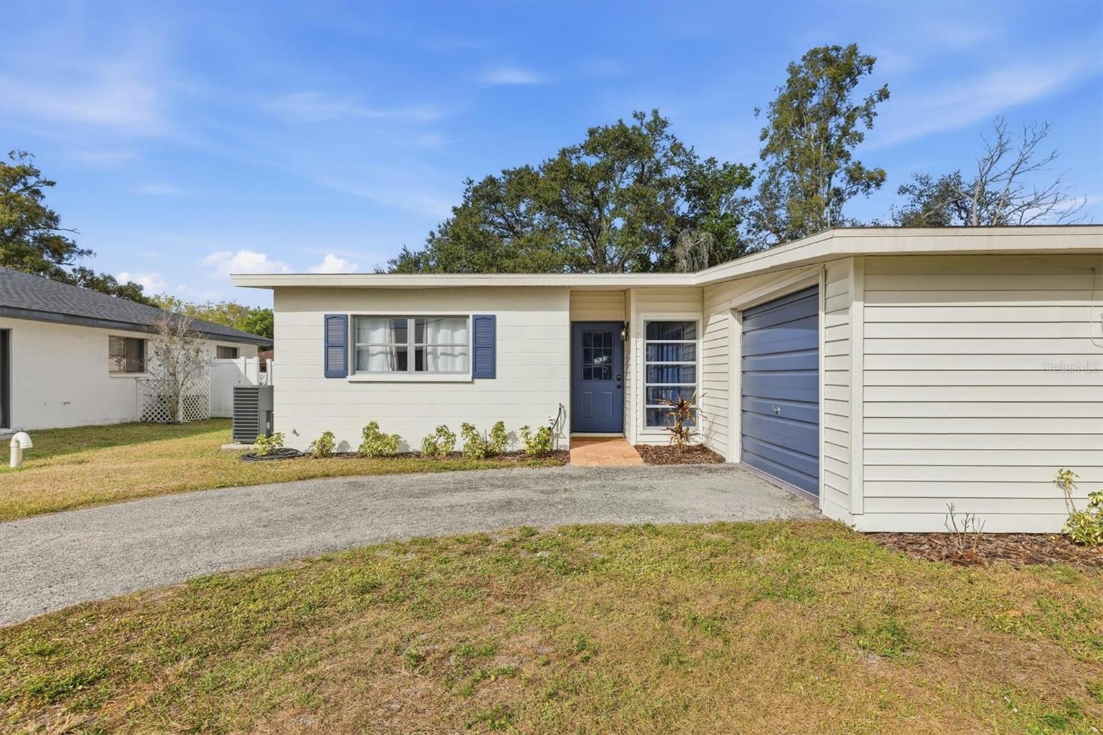 THIS PROPERTY QUALIFIES FOR A 1% LENDER INCENTIVE IF USING OUR PREFERRED LENDER! Charming and completely updated 2-bedroom home centrally located near everything Sarasota has to offer. This inviting residence features a spacious great room with vaulted ceilings, creating a bright, open feel, and luxury vinyl flooring throughout. A dedicated dining room adds flexibility for everyday living or entertaining. The kitchen is well-appointed with a custom tile backsplash, undermount sink, 42-inch cabinets, and stainless steel appliances, making it both stylish and functional. The bathroom features a custom vertical tile tub surround, adding a modern touch. Built with solid block construction, the home includes an oversized attached 1-car garage with laundry conveniently located in the garage. Step outside to enjoy the large, fully fenced yard, perfect for relaxing, pets, or outdoor gatherings. Located close to downtown Sarasota, schools, shopping, and dining, and just minutes from world-famous Siesta Beach, this property is an excellent opportunity for a primary residence or a seasonal monthly rental. Comfortable, updated, and ideally situated—this home truly checks all the boxes.