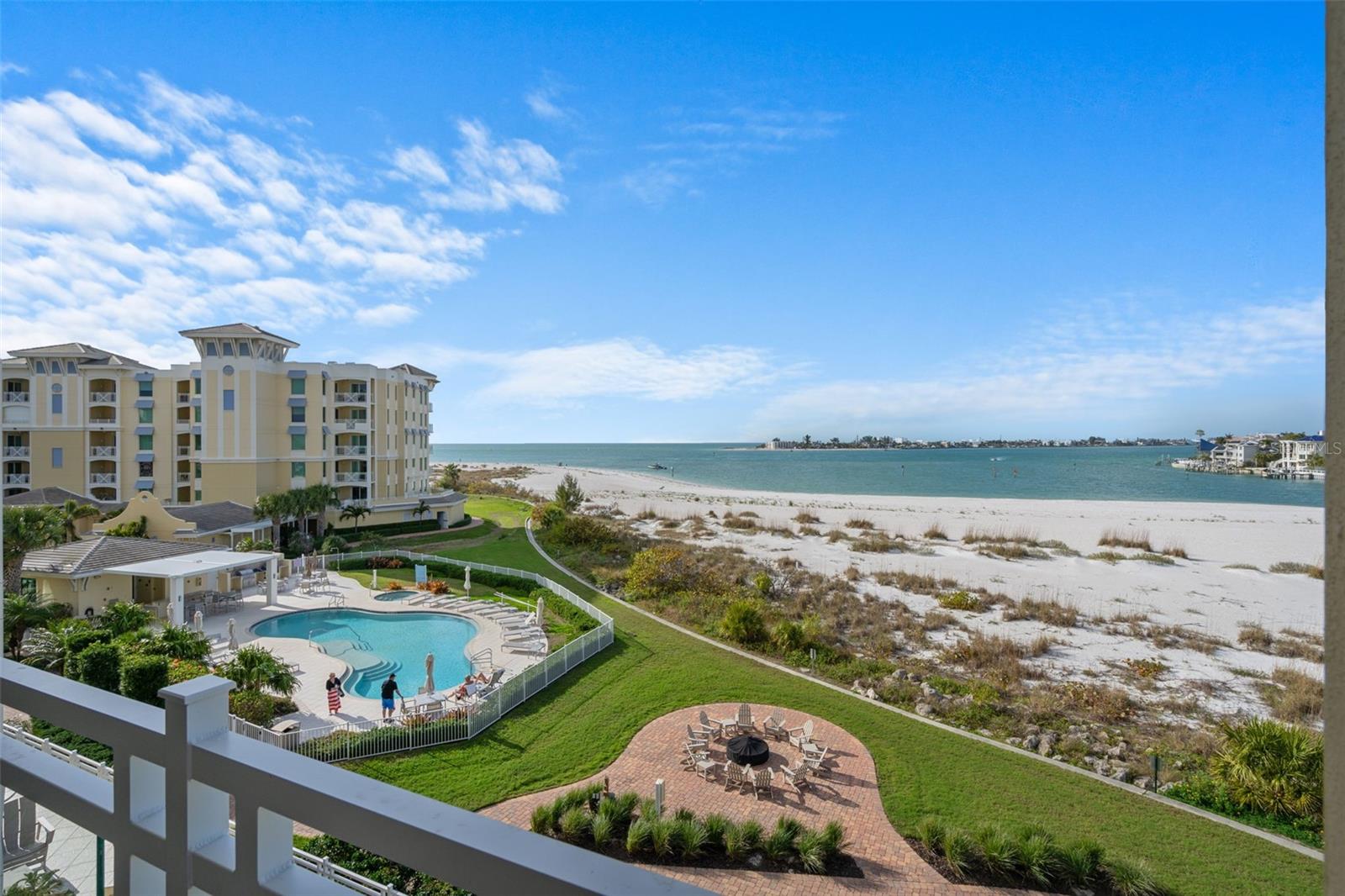 Welcome to an exceptional waterfront condominium in the highly sought-after gated community of Sunset Pointe at Collany Key on the beautiful island of Tierra Verde, Florida. Perfectly positioned along the Gulf of Mexico, this elegant 3-bedroom, 3.5-bath condominium offers 2,852 square feet of coastal living with breathtaking water views and unforgettable sunsets. Arrive via your semi-private elevator and enter your private foyer that opens to a light-filled interior designed for both comfort and entertaining. The open-concept floor plan seamlessly connects the living room and dining area, to a beautifully appointed kitchen with high end appliances, custom cabinetry and abundant counter space.  Expansive floor-to-ceiling sliding glass doors frame panoramic Gulf views and open to a generous waterfront balcony—the perfect place to enjoy spectacular sunsets and sea breezes. Just off the kitchen, a versatile den or office with elegant French glass doors offers flexible living space. The primary suite is a true private retreat, featuring direct balcony access, spacious walk-in closets, and a spa-inspired en-suite bath complete with dual vanities, a soaking tub, and a large walk-in shower. Two additional well-appointed guest bedrooms, each with their own baths, provide comfort and privacy for family and visitors.  Additional highlights include a full laundry and utility room, a double-car garage, and a private air-conditioned storage unit, offering both convenience and functionality.  Residents of Sunset Pointe at Collany Key enjoy an array of resort-style waterfront amenities, including: Private beach access, Geothermal heated saltwater pool and spa, Beachside fire pits and gathering areas, fitness center, Kayak launch and waterfront boardwalk, Fishing pier and scenic walking trails and multiple barbecue stations around this beachside property. Surrounded by the pristine natural beauty of Shell Key Preserve, this exclusive gated community offers unspoiled coastal nature. Located just minutes from Tierra Verde’s waterfront restaurants, marinas, and boating, approximately 15 minutes to vibrant downtown St. Petersburg, and within convenient reach of Tampa International Airport and St. Pete–Clearwater International Airport. This is the perfect Gulf view condo to enjoy the Florida sunshine and call home!  Call for your showing today!