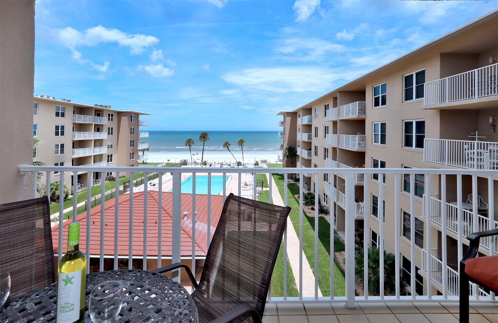 Imagine nothing to do but walk on the beach or lounge by the pool. Desirable 4th floor unit has a wide open balcony with beautiful Ocean views. One bedroom, one bath, living/dining room combo and fabulous updated kitchen. There’s even a bonus room currently used as a ’bunk room’ that can easily be used as an office or studio. HVAC Replaced in June and HOA fees are really great for beachside condos. Ready to move right in or use as a rental unit as this comes fully furnished - turn-key! ;LocationDescription: Condo ;Water: City