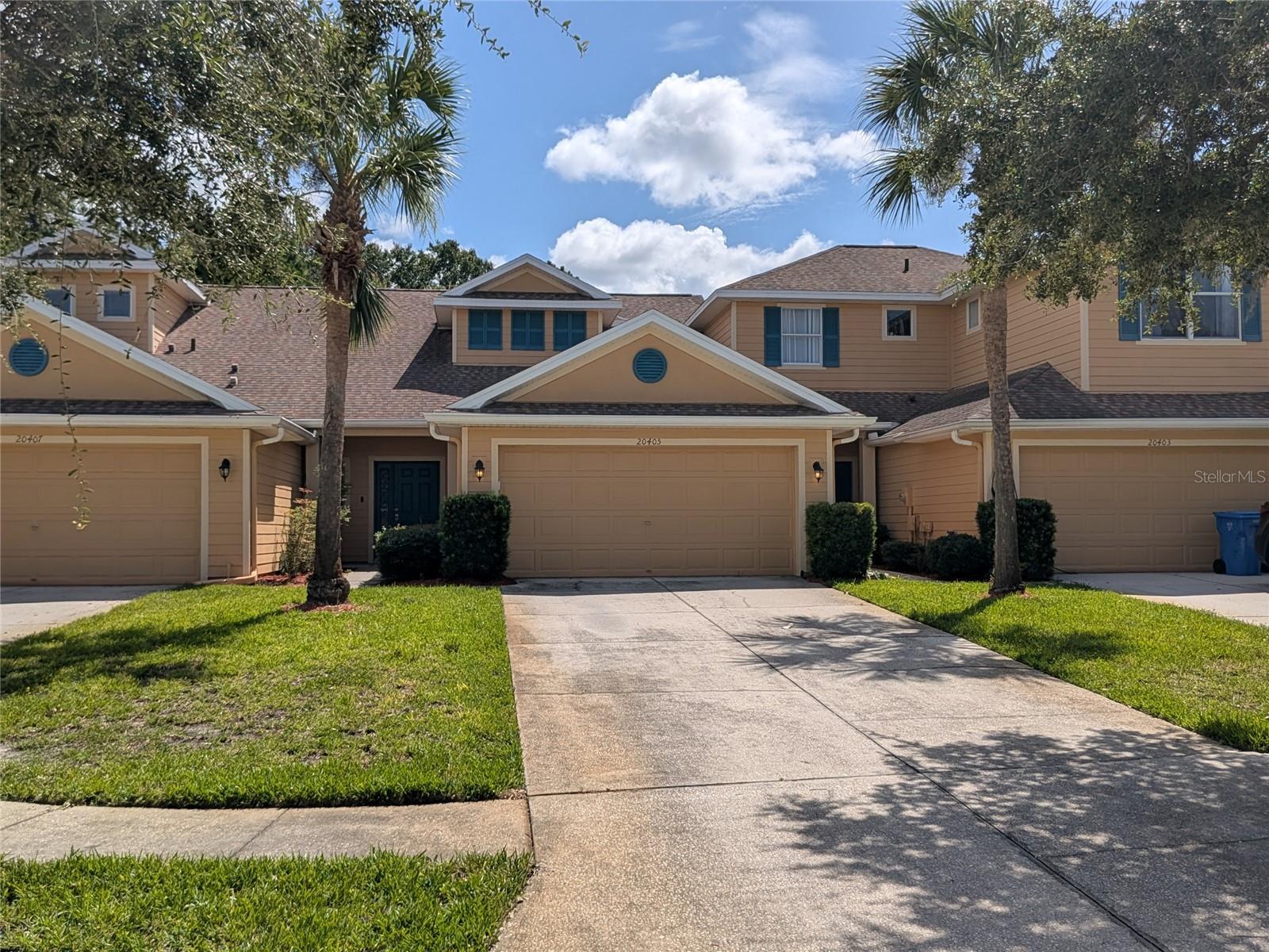 Welcome to 20405 Harvest Oak Court! 3 Bedroom, 2.5 Bath townhome in the Brentwood community of Live Oak. Convenient location with easy access to shopping, dining, and major roadways. Open living and dining area with wood-look laminate flooring. Primary bedroom and laundry located on the ground floor. Primary bath includes a walk-in shower, dual-sink vanity, and walk-in closet. Half bath also on the main level. Kitchen features granite countertops, stainless steel appliances (French-door refrigerator, dishwasher, range, microwave), and white cabinetry. Sliding glass doors off the living area lead to a back patio and yard. Two additional bedrooms upstairs, each with a closet and ceiling fan, share a full bath with tub/shower combo. Washer and dryer included. 2-car garage. Tile and laminate flooring throughout. Residents have access to all Live Oak Club amenities. Rent $2,250/month. Application fee $75 per applicant; all occupants 18 and older must apply and be named on the lease.