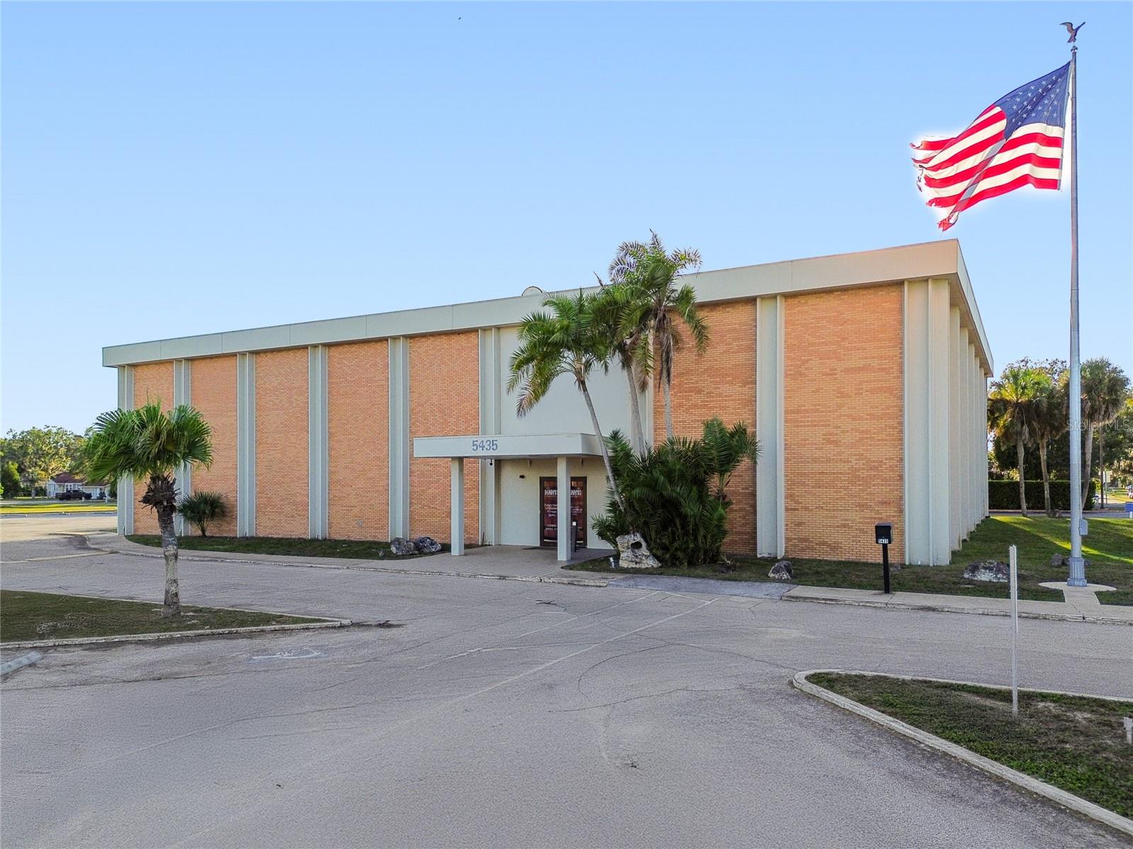 Positioned along the highly visible Gall Boulevard/US 301 corridor, this property sits within one of Zephyrhills’ most actively planned redevelopment zones, creating a rare opportunity for investors and developers to align with long-term improvement goals. Zoned Community Commercial (C-2). The site lies within a priority area of the City’s GoingPLACES Mobility Plan, their Redevelopment District and a designated Opportunity Zone. (OZ) 
 - 5435 Gall Boulevard presents a unique opportunity to position a business or redevelopment project within an actively improving district where infrastructure investments are expected to elevate visibility, traffic flow, customer access, and long-term commercial value. The first floor features a large open lobby, multiple private offices, conference room(s), teller stations, vault areas, storage, break-room, mechanical space, and dual restrooms, creating a move-in ready framework for financial, medical, professional office, or service-based users.
The second floor includes 11,019 SF of additional offices, conference room, open workspace, restrooms, storage, and mechanical areas, offering expansive capacity for multi-department operations, call centers, back-office workflows, or redevelopment into a modern multi-tenant environment. The plans reflect a structurally efficient footprint with clear circulation, vertical stair access, and flexible space divisions that support both adaptive reuse and full-scale redevelopment.

On-site parking for approximately 75+ vehicles, offering a strong parking ratio for office, medical, or service-oriented users. Zephyrhills is entering a period of economic expansion, highlighted by two major companies recently committing to the area. Their presence is expected to drive new employment, attract additional ancillary businesses, and increase demand for retail, medical, and service-oriented uses along Gall Boulevard. Roof replaced in 2022. There are no known environmental issues, subject to buyer verification during due diligence. The concrete/block building offers more than 22,000 square feet on a 2 acre lot. Annual Average Daily Traffic (AADT) count of 19,800. Surveys, redevelopment plans, and supporting documents are available upon request.