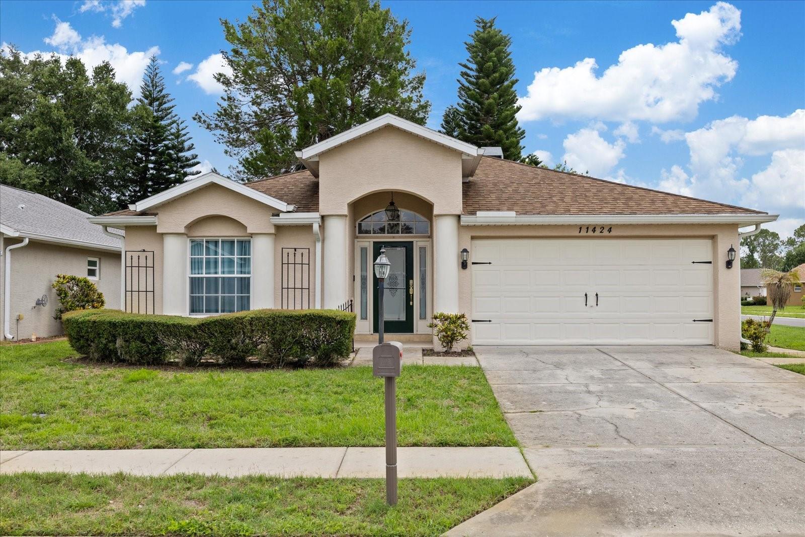 Welcome home to this beautifully updated 4-bedroom, 2-bathroom residence situated on a desirable corner lot in New Port Richey, Florida. Offering a spacious open-concept layout, this home seamlessly connects the kitchen and living areas, creating the perfect space for entertaining and everyday living. The kitchen features brand-new cabinetry with abundant storage, while new flooring throughout the home adds a fresh, modern feel.
The spacious primary suite serves as a private retreat, complete with sliding glass doors leading directly to the screened patio, a large walk-in closet, and an impressive en-suite bathroom featuring dual vanities, a relaxing spa tub, separate walk-in shower, and linen closet. Additional updates include new closet doors with fresh paint, new toilets, a newly screened patio enclosure, and a NEW ROOF installed before closing!!!
A cozy wood-burning fireplace adds warmth and character to the living space, while French doors and multiple sliding glass doors bring in natural light and provide easy indoor-outdoor living. One secondary bedroom offers the added convenience of two closets, providing exceptional storage options.
The home also features a two-car garage and a dedicated indoor laundry room conveniently located just off the garage. Ideally positioned near downtown New Port Richey, shopping, dining, parks, and major commuter routes including State Road 54, this move-in-ready home combines comfort, functionality, and location. Whether you're looking for more space, modern updates, or a prime location, this property delivers it all.