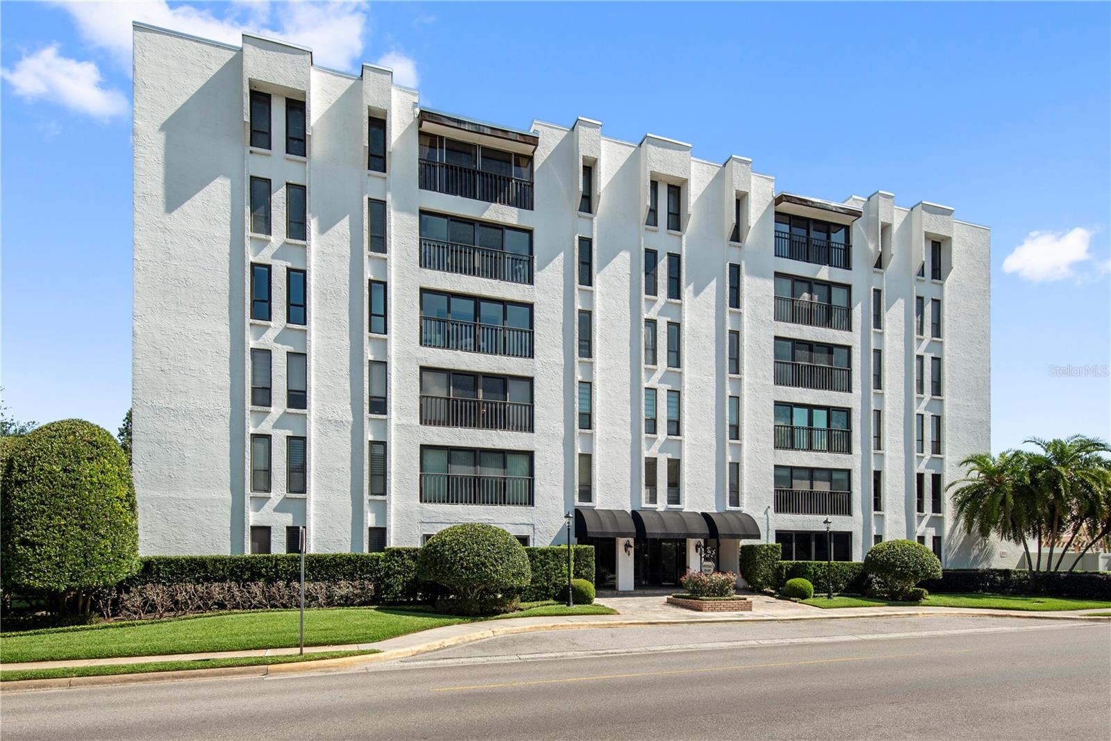 Winterset is celebrated for its boutique scale, mature landscaping, and timeless Winter Park character. Residents enjoy glimpses of Lake Osceola, tranquil surroundings beneath stately oaks, and the privilege of living in a community where privacy and exclusivity are paramount. This fully remodeled Penthouse Suite's location is unmatched—one block to Park Avenue, offering effortless access to fine dining, boutique shopping, the Morse Museum, Rollins College, and the scenic Chain of Lakes. Whether you’re downsizing, escaping winter months or seeking a refined second home, this residence delivers the perfect blend of luxury, simplicity, and prestige. Designed for comfort and ease, the home welcomes you with a bright, open living space enhanced by crown molding, warm natural light, and a seamless flow ideal for both quiet escapes and intimate entertaining. The primary suite features a generous walk-in closet, while the kitchen offers modern functionality with quality appliances and thoughtful storage. This unit offers its own washer/dryer combo unit, large exterior storage closet, assigned parking space under canopy and extra open parking spaces.  Please note rentals are not allowed and no pets except for Service Animals.