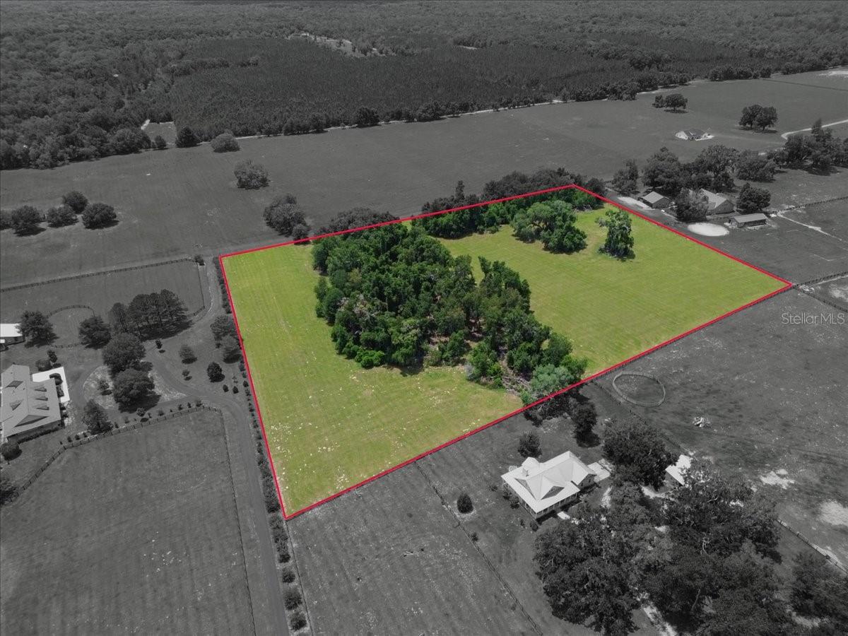 One or more photo(s) has been virtually staged. Discover the perfect blend of privacy, recreation, and natural beauty on this exceptional 10-acre homesite in the gated community of Bluebird Landing. Believed to be one of the highest lots in the subdivision, this property offers an ideal setting to build your dream home while enjoying the peace and security of a private rural community.

Predominantly cleared and ready for your vision, this beautiful parcel features a desirable mix of open pasture and mature hardwoods. A scenic stand of trees along the side of the property provides privacy, shade, and character while leaving the majority of the acreage open and highly usable. Whether you're planning a custom home, horse property, workshop, or family homestead, the possibilities are endless.

Bluebird Landing residents enjoy exclusive access to the Santa Fe River through a private community boat ramp and river access area, perfect for boating, fishing, kayaking, and paddleboarding. The community is also equestrian-friendly, offering plenty of room to enjoy the North Florida lifestyle.

Conveniently located approximately 1.5 miles from River Rise Preserve and 4.5 miles from Rum Island Park, you'll have easy access to crystal-clear springs, hiking trails, and endless outdoor recreation.

Whether you're searching for a private retreat, equestrian property, or the perfect place to build your forever home, this rare 10-acre parcel offers the space, privacy, and lifestyle you've been looking for.

One or more photos has been virtually staged with a home to show what could be built on the lot.