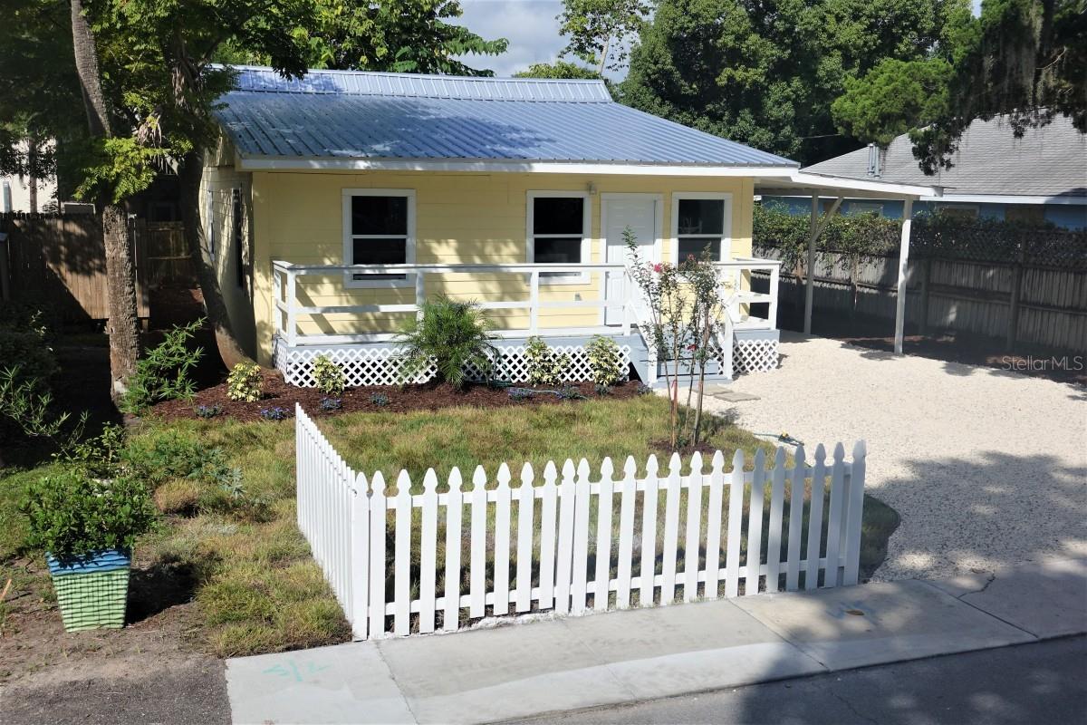 Fully renovated open floorplan bungalow in highly desired historic district of New Smyrna Beach.  Minutes away from the beach, and just a two minute walk to historic Canal Street shopping and restaurants.  This beauty has been completely renovated:  new metal roof, new central AC, new floors, new paint, new bathrooms, new kitchen, new windows, new appliances, new overhead recessed lighting, new landscaping – too much to list - all you need to do is move in.  Walk in the front door to a spacious open floorplan.  All bedrooms are oversized, with the master having an en-suite bathroom and huge walk in closet.  There is an oversized laundry / utility room, and plenty of flex space throughout the home.  The kitchen has been tastefully remodeled and includes tons of cabinet space, granite countertops, and brand new stainless appliances.  Beautiful fenced in backyard to make your own beach oasis.  Rare opportunity to own a home in this condition in the historic district of NSB at this price point!! ;Water: City