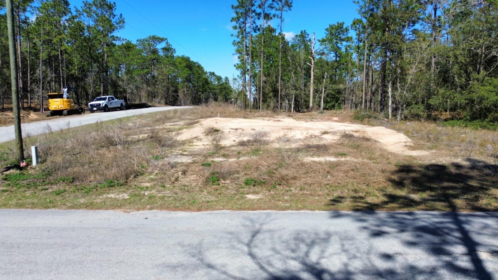 Build your dream home on this beautiful 0.24-acre homesite located at 24491 NW Hemlock Ave, Dunnellon, FL. Nestled in a peaceful and growing community, this property offers the perfect blend of privacy, natural surroundings, and everyday convenience.

With public water and electricity available, much of the groundwork is already in place for your future home. The property is designed for a septic system, a common and reliable solution in the area.

Enjoy the best of Florida's outdoor lifestyle with the world-famous Rainbow Springs just a short drive away, where you can enjoy crystal-clear springs, kayaking, tubing, boating, hiking, and year-round recreation. You'll also appreciate the convenient access to shopping, restaurants, schools, medical facilities, and everyday essentials, while remaining within easy driving distance of Ocala, Crystal River, and the Gulf Coast.

Whether you're looking to build your forever home, a seasonal retreat, or make a smart investment in one of Central Florida's growing communities, this property offers outstanding potential. Don't miss this opportunity to own a spacious homesite in a desirable location with excellent future value.