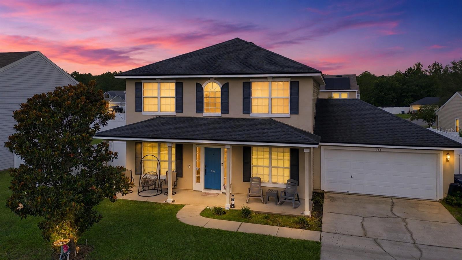 Welcome home to this beautifully maintained 4-bedroom, 2.5-bath home built in 2007, offering the perfect blend of comfort, style, and peace of mind. Recent updates include a new roof (2019), A/C system, and hot water heater, making this home truly move-in ready.

Inside, you'll find fresh new carpeting and a spacious, functional floor plan designed for both everyday living and entertaining. The kitchen features stainless steel appliances and flows seamlessly into the main living areas, where an electric fireplace adds warmth and charm for those occasional chilly Florida evenings.

Step outside to the screened-in lanai overlooking a large, fully fenced backyard—perfect for relaxing, entertaining, children, or pets. An attached two-car garage provides plenty of storage and convenience.

Located in a desirable community with a swimming pool and playground, this home offers great amenities while being ready for its next owners. Don't miss your chance to own this beautifully updated property. Schedule your private showing today!