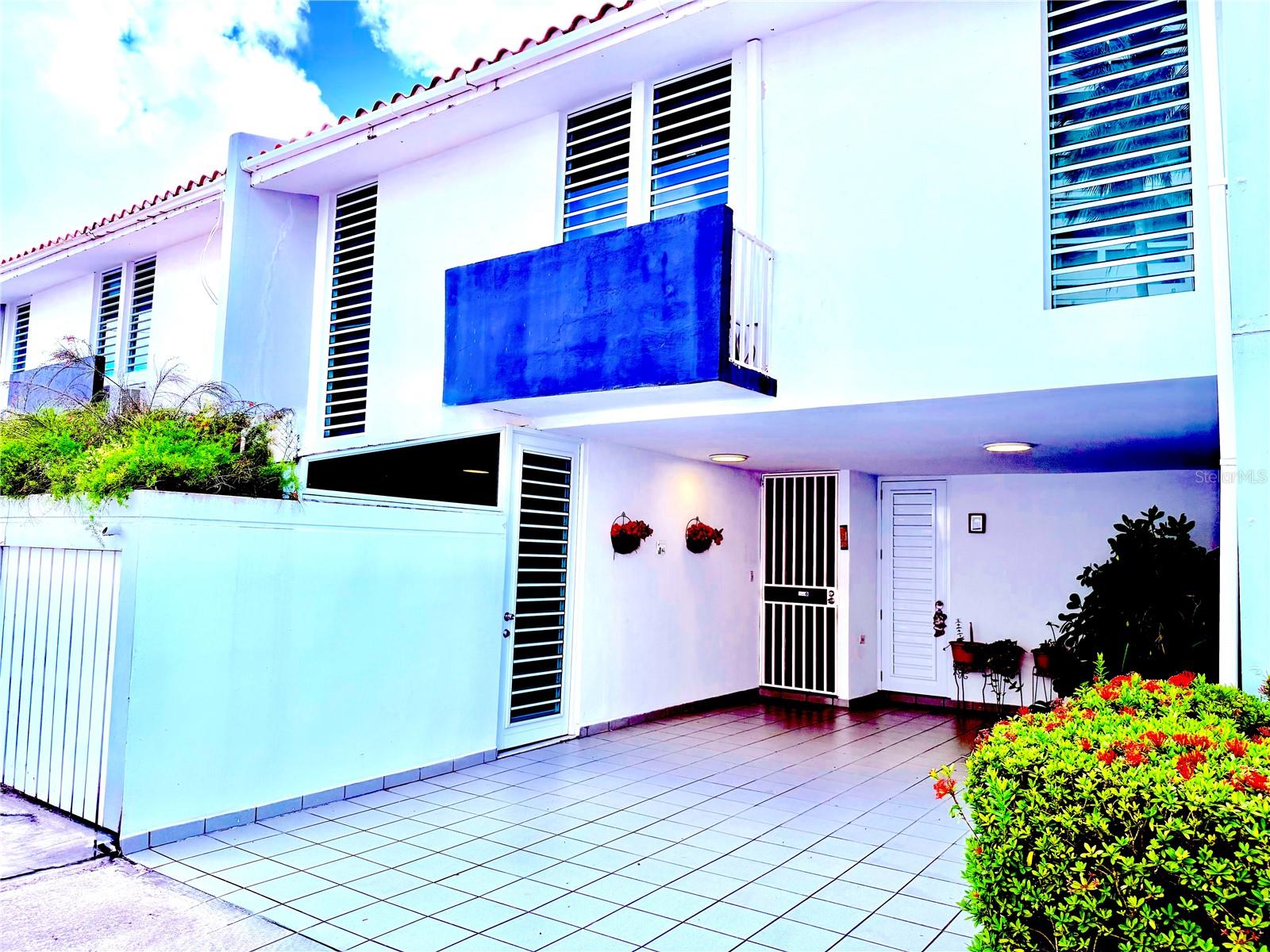 Live the Isla Verde Beach lifestyle at Playa Dorada. Unique Townhouse 

Ideally located in the heart of Isla Verde, this tasteful   4-bedroom, 2.5-bath townhouse-style residence offers a truly cosmopolitan lifestyle just steps from the beach.
This unique two-level home features approximately 2,186.22 sq. ft. of total construction, highlighted by an enormous covered indoor terrace that adds exceptional living and entertaining space.

The first level features a fully equipped  kitchen with laundry area , an open-concept living and dining area, a powder room,  covered terrace creating the perfect setting for entertaining or enjoying intimate gatherings
garage.

The second level includes the primary bedroom, along with a generously sized flex space . The three additional bedrooms and 2 bathrooms are also located on this level. Each bedroom offers closet space, providing comfort and functionality throughout.

Additional features include:

Two  parking spaces
Generator for communal areas and the townhouse, plus an additional outlet that can power several appliances/equipment
Water cistern
Playa Dorada is a full-service condominium in Isla Verde offering: 24-hour security
Fitness center,Swimming pool, Direct beach access, convenience store.

Conveniently located near The Ritz-Carlton, top restaurants, hospitals, supermarkets, shopping, and just minutes from the international airport.

Monthly Condo Fee: $488.99 (includes water)
Communal Insurance: $4,974.40 yearly
Property Taxes: $743.00 every six months