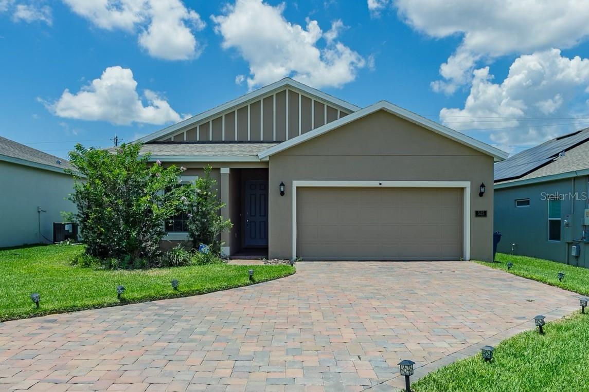 Welcome to the beautiful community of Orchid Grove! Walking in the front door of this Fully Furnished home you are greeted by two bedrooms and a full bath on the left and down the hallway your find the breathtaking open floor plan Kitchen/Living/Dining room! the kitchen boasts granite countertops and stainless steel appliances. From the living room you find the tranquil master bedroom, complete with a large in-suite bathroom and  walk in closet. Another highlight of the house is just out the sliding glass door to your private covered Lani and huge fenced in backyard! This backyard offers enough space for anything you can image and is perfect for unwinding after a long day! the community offer playground and community pool, close to theme parks like Universal, SeaWorld, Disney, Lego Land, and close to Restaurants, Posner Park Shopping Plaza and more! Schedule Your Tour Today!