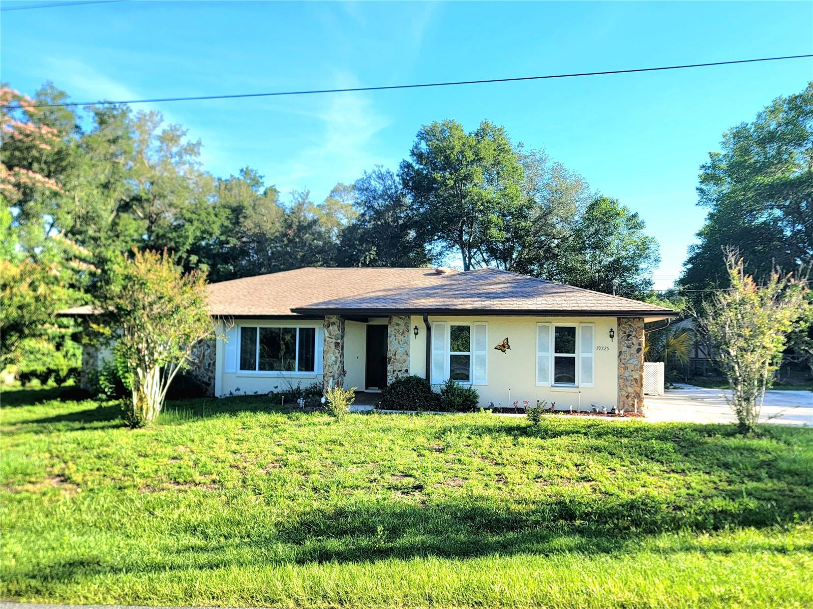 Welcome home to this spacious 3 bedroom, 2 bath home in Rainbow Lakes Estates, offering 1,809 sq ft of living space on a generous .48-acre lot. This home features a comfortable split-bedroom floor plan, multiple living areas, a fireplace, and an eat-in kitchen with pantry space. Step outside and enjoy true Florida living with a screened porch, pool area, fenced backyard, and room to relax, entertain, garden, or simply enjoy the extra space.

The property also includes a large shed for storage, tools, lawn equipment, or hobby use. Located in the peaceful Dunnellon area, this home offers a country feel while still being within convenient reach of shopping, restaurants, schools, Rainbow Springs, the Rainbow River, outdoor recreation, and all that Dunnellon and the surrounding area have to offer.

Whether you are looking for a primary residence, seasonal home, or investment opportunity, this property has plenty of potential.