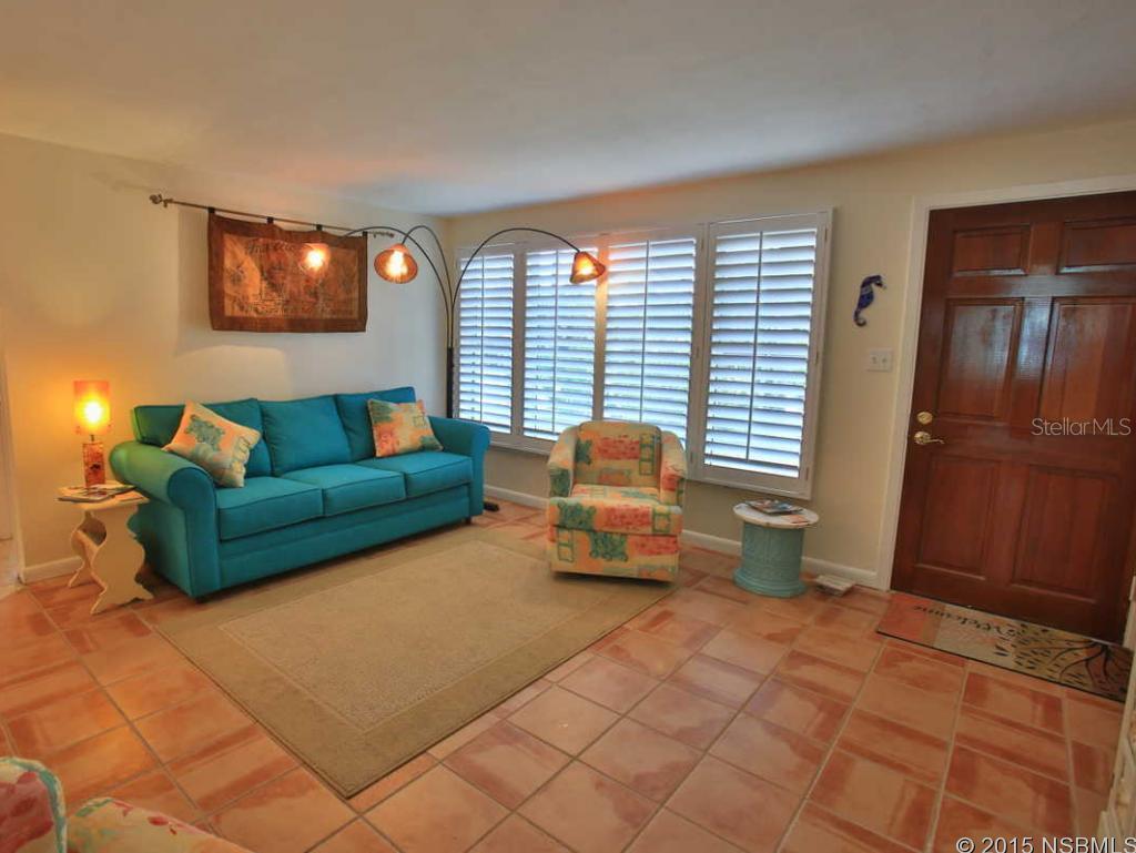 Centrally located Salt Water POOL home on corner lot a few blocks walk to the ocean and shopping.  This 3 bedroom/ 2 bath home with detached office/den with plenty of parking for RV, Boats or Trailer.  Driveway access from both Saxon and 10th Ave.  Updated bathrooms, kitchen with gar range and stainless appliances, double pain insulated windows, Plantation Shutters, New Interior Doors, newly updated electrical, AC new in 2011, huge screened pool deck making  a great venue for special occasions or entertaining as french doors lead out from the kitchen and master bedroom.  Southwest feeling with tile floors, pastel colors and some custom Mexican work  Workshop/office off pool is great for storage of surfboards, beach toys, tools etc but currently being used as an office. Freshly painted inside and out!  Newly fenced and Seller replacing roof March 2015. ;Water: City