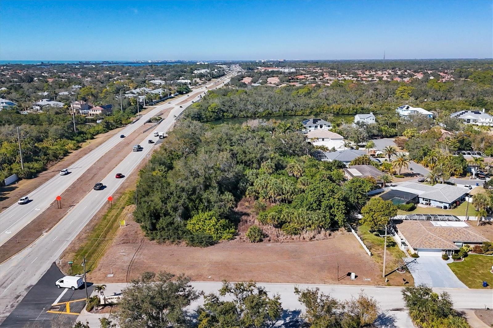 2.51 Acre Lot directly on South Tamiami Trail in Osprey - where Sarasota is growing and expanding!  This property is zoned OPI and would be a good fit for an office/medical center or retail with residential above.  Great exposure with consistently heavy traffic from Sarasota to Ft. Myers on S. Tamiami Trail just minutes from Sarasota Bay, Oscar Scherer State Park, Legacy Trail and all that Sarasota has to offer!  Property Appraiser and USPS just corrected that this lot is in Osprey - previously shown as Nokomis.