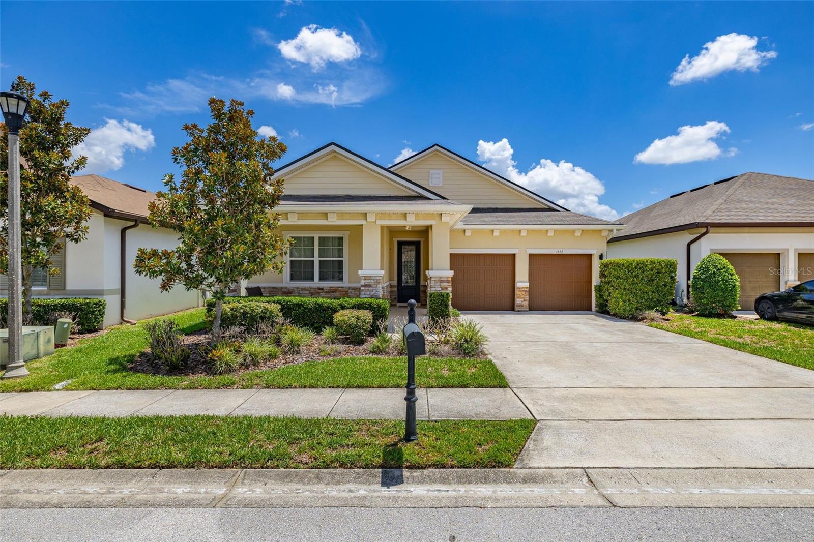 Welcome to your Florida retreat in the highly sought-after gated community of The Dale at West Haven! Ideally located just minutes from ChampionsGate, Posner Park, and Central Florida's world-famous attractions, including Walt Disney World, this beautifully maintained 4-bedroom, 2-bath home offers the perfect combination of style, comfort, and convenience. From the moment you arrive, you'll appreciate the inviting covered front porch—the perfect spot to enjoy your morning coffee or unwind after a long day. A decorative front with beautiful glass insert welcomes you into a bright, open floor plan designed for both everyday living and effortless entertaining. Built by Richmond American Homes, this thoughtfully designed residence features porcelain tile flooring throughout the main living areas, with comfortable carpeting in the bedrooms. Upgraded lighting throughout the home adds a modern touch and enhances every space. The spacious kitchen is the heart of the home, boasting granite countertops, island with large sink,  stainless steel appliances, a large center island, and abundant upgraded cabinetry. Overlooking the dining and living areas, it's an ideal space for gathering with family and friends. The split-bedroom floor plan provides privacy, with a generous primary suite offering a true owner's retreat. The luxurious ensuite bath features quartz countertops, dual sinks, an upgraded walk-in shower, a private water closet, and a large walk-in closet. The secondary bathroom is equally well-appointed with quartz countertops, creating a cohesive, upscale feel throughout the home. Step outside to the covered lanai, where you'll enjoy a peaceful backyard setting that's perfect for outdoor dining, weekend barbecues, or simply relaxing while enjoying the Florida weather. Residents of The Dale at West Haven enjoy exceptional HOA amenities and services, including lawn maintenance, cable TV, and high-speed internet, allowing for truly low-maintenance living. Community amenities include a resort-style pool, clubhouse, fitness center, tennis courts, and beach volleyball courts, providing endless opportunities for recreation and relaxation. Whether you're searching for a primary residence, vacation home, or an excellent investment opportunity with short-term rental potential, this home offers outstanding value in one of Davenport's most desirable communities. Don't miss your opportunity to own this exceptional home—schedule your private showing today!