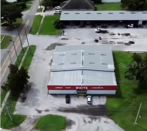 Highlights:
Long-time home of a well-known building supply business (est. 1975)
Air-conditioned showroom and office space (12 ft. ceiling height)
Ample warehouse space (16–18 ft. ceiling height) ideal for storage, racking, or operations
Detached mezzanine-style building on the opposite side of the yard
Fully secured, fenced lay down yard with plenty of room for equipment and materials
 
Prime logistics hub! Excellent truck access with direct proximity to Highway 60 — a major supply chain corridor through Central Florida

Ideal for building supply, contractor yard, or industrial operations
Strong commercial zoning with redevelopment potential
Convenient location off Woodlawn Ave & Parker St in Bartow