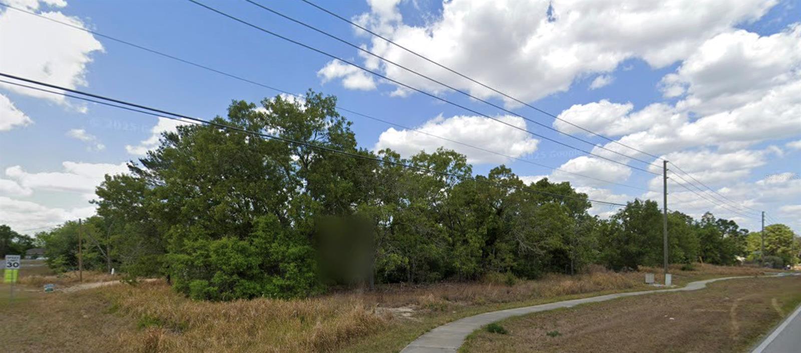 Build your dream home on this residential & ACCESSIBLE vacant lot! Located in an established area with homes nearby, this buildable parcel offers an excellent opportunity for a primary residence, vacation home, or investment property. Enjoy the flexibility of creating a home that fits your lifestyle while still being conveniently located near shopping, dining, schools, and major roadways. Whether you're ready to build now or planning for the future, this property provides a great foundation for your vision. Buyer to verify all zoning, building, and utility information with the appropriate authorities.