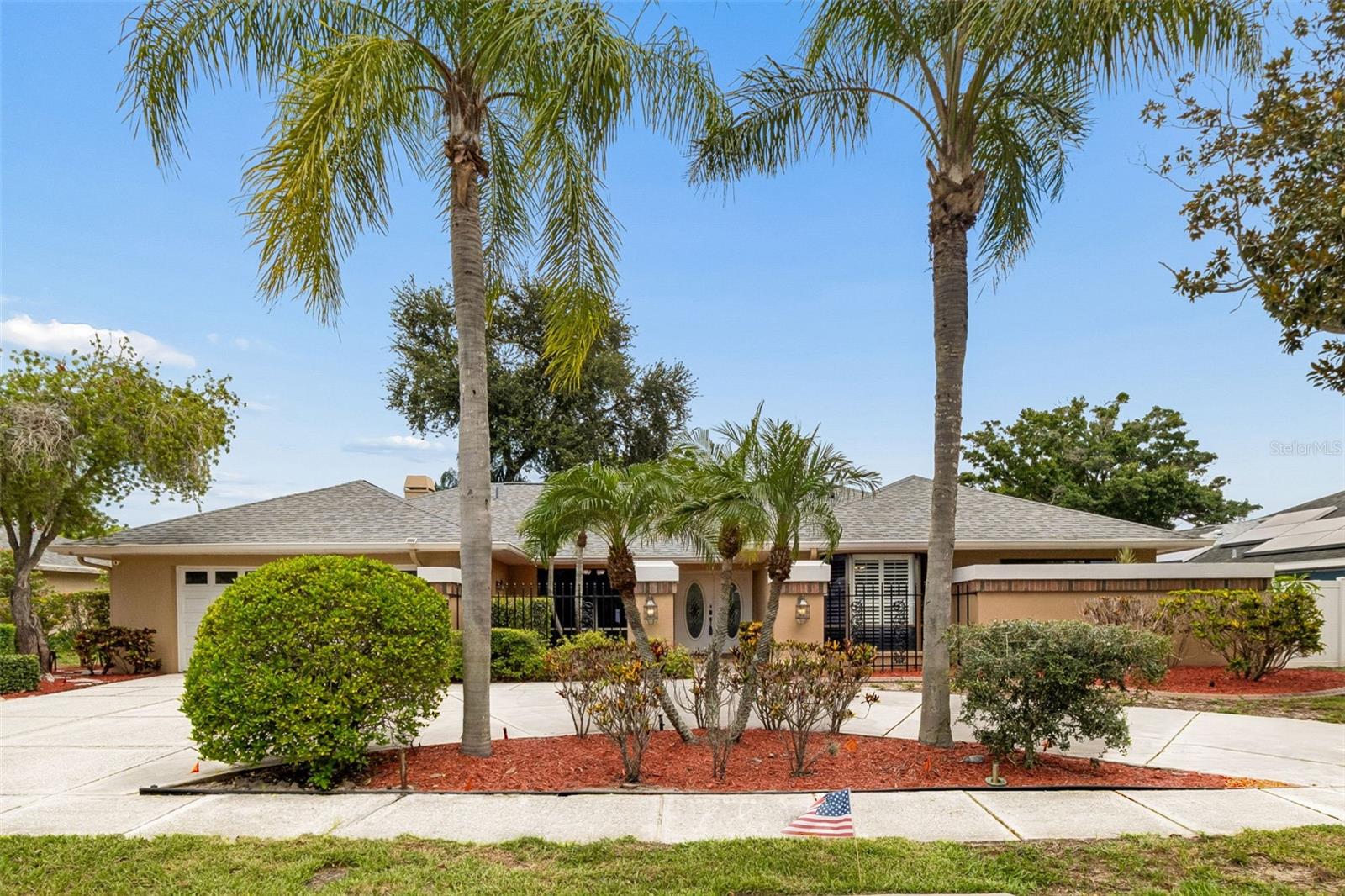 A Rare 4 Beds 3 Baths nearly 2,900sqft Luxury POOL home in one of Clearwater's Most Desirable Neighborhoods—with NO HOA. 
Welcome to the timeless architecture, exceptional craftsmanship, and resort-style living that come together in a home that is truly unforgettable where every day feels like a vacation. Nestled within the Coachman Ridge community, this stunning residence offers an extraordinary lifestyle that rarely becomes available.
From the moment you step through the grand entrance, soaring ceilings, abundant natural light, and elegant architectural details create an immediate sense of sophistication and warmth. Every room has been thoughtfully designed to balance spaciousness with comfort, making the home equally perfect for intimate family living and grand-scale entertaining—with NO CARPET.
At the heart of the home, the expansive kitchen flows effortlessly into the inviting family room, where a beautiful fireplace, custom wet bar, and walls of glass overlook your own private backyard oasis. 
The chef-inspired kitchen overlooks the family room and breakfast nook, creating the perfect space to prepare meals while staying connected with family and guests. The desirable split-bedroom layout offers exceptional privacy, highlighted by a luxurious primary suite featuring dual walk-in closets, direct pool access, and a spa-inspired ensuite bath with dual vanities, a soaking tub, and separate walk-in shower designed for relaxation after a long day.
Step outside to your own private Florida paradise. The spectacular screened lanai showcases a sparkling heated pool and spa, complemented by a fully equipped outdoor entertainment hub complete with granite countertops, sink, beverage/wine refrigerator, and plenty of room for outdoor dining and entertaining year-round.
Thoughtful upgrades include a newer roof and new solar hot water were also added in 2018, Updated both HVAC systems have been replaced (2018 and 2020) and paired with NEST thermostats, solar hot water, and smart home features providing comfort, efficiency, and peace of mind. Freshly transformed with brand-new interior and exterior paint. Impeccably maintained.
Perfectly positioned just minutes from world-famous Clearwater Beach, Tampa International Airport, championship golf, top-rated dining, shopping, golf courses, parks, and excellent schools. Whether you're looking for a peaceful retreat or the perfect home for entertaining, this exceptional property truly offers the best of Florida living.
If you've been waiting for a home that stands apart from the ordinary, your search ends here. Schedule your private showing Today and Welcome Home!