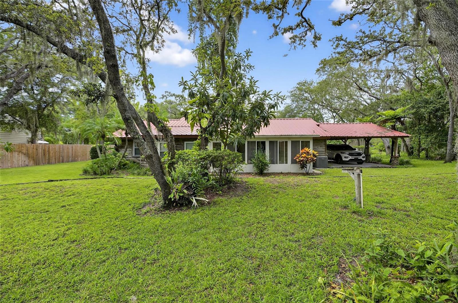 Looking for a family compound or a multiple unit income producing property?  This property has 5 acres of space in middle of it all. Spanning 2 parcels - this property is comprised of 6 separate living units, 1 warehouse space and two additional outbuildings.  If buying as a primary residence, the 3 bed, 2 bath main log cabin is a beautiful home tile floors and upgraded kitchen with solid wood 42” cabinetry and beautiful granite countertops. If buying to have income – there is 1 single family block (“log”) home, 3 manufactured homes, a "cottage" and an extra living apartment in the warehouse.  The 2200 square foot warehouse creates flexibility in use for either tenants or for a business owner to bring operations onto their own land.  All units have leases in place.  Sellers are offering owner financing option.  Please inquire for details.