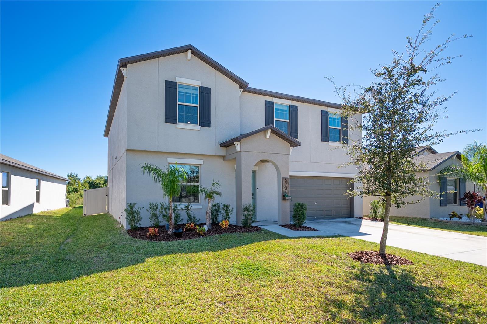 If you are looking for a perfect like-new home with a very competitive and assumable interest rate, check this out! This 4-bedroom, 2.5-bathroom two-story home offers plenty of space for your growing family. With 2,653 square feet, loft area, large kitchen, granite countertops, large walk/in closet and an additional flex space downstairs for that 5th bedroom or office space, there's truly room for everyone. The fully fenced premier lot offers no rear neighbors, ensuring privacy and tranquility. Picture yourself enjoying quality time with your family in the backyard and hosting great dinner parties in the updated kitchen. Commuting to Tampa and Orlando is a breeze, thanks to the proximity to I-4 and the Polk Parkway. And that's not all! The community of Riverstone offers resort-style amenities for you to enjoy. Enjoy the resort-style amenities, community pool, relax in the cabana, or have fun at the playground. Stay active with the fitness station, and make sure your furry friends have their share of outdoor fun too, with the small and large dog park. Don't wait any longer! This home is ready for you and your family to create lasting memories. Come experience convenience, luxury, and community living at Riverstone in Lakeland. You deserve it!