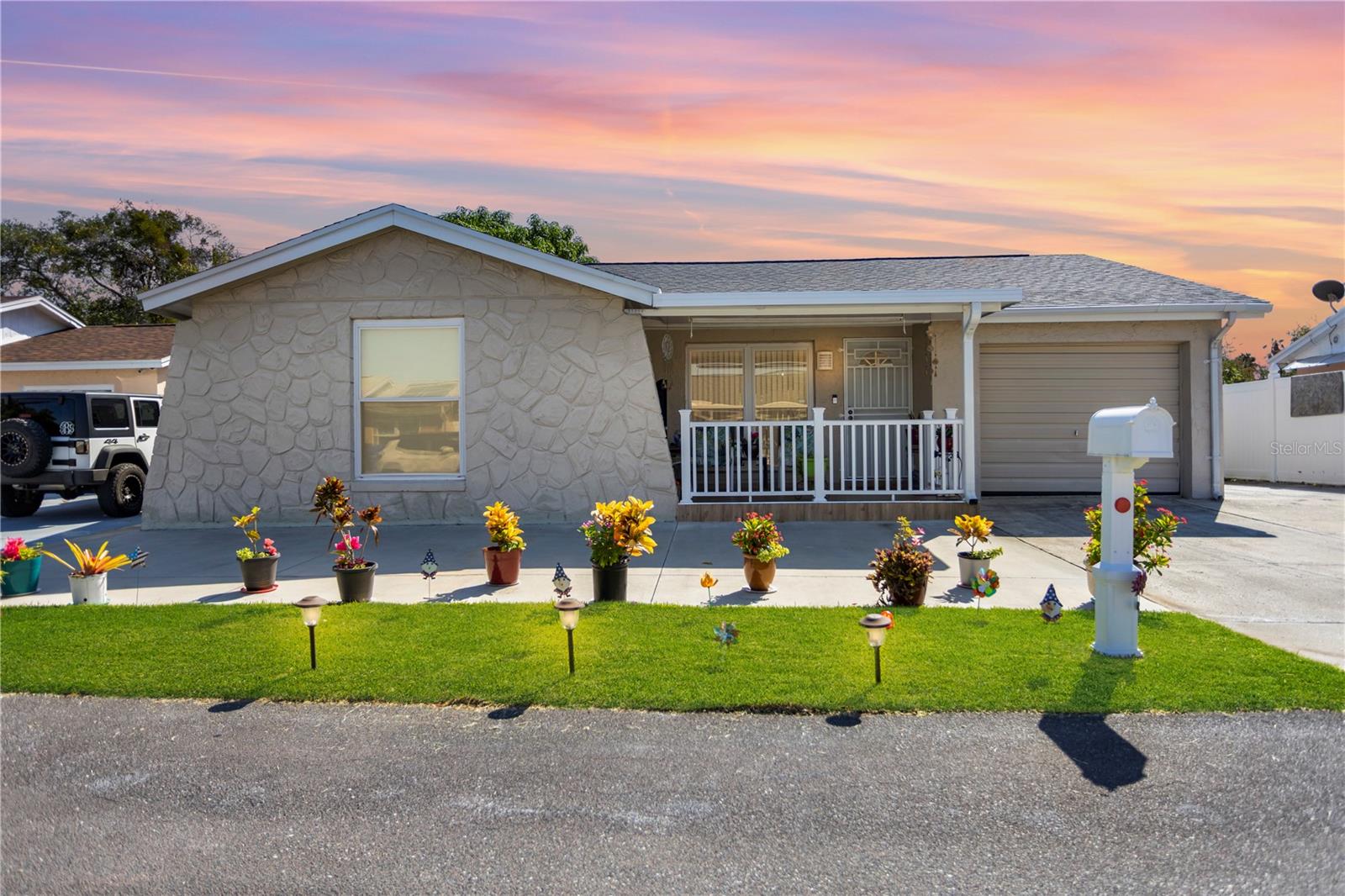 A well-maintained home with a newer Roof (2019), newer A/C (2020), assumable VA loan, convenient location, and NO HOA. Do I need to say more? This 3-bedroom, 2-bathroom, 1-car garage home nestled in the heart of Town ‘n Country features great curb appeal with low-maintenance landscaping and a cozy covered front porch to welcome guests. As you enter the home, you’ll notice the home exudes a sense of quality and care. Upgrades include: Vinyl flooring through the living area (2020), renovated kitchen (2021), renovated bathroom (2021) and more. Enjoy the fully-fenced backyard that includes two storage sheds, lime tree and luscious mango tree! Just imagine relaxing under the shade of the mango tree and enjoying fresh fruit! With no HOA to worry about, you have the freedom to make this home truly your own. Plus, its prime location off the Veterans Expressway makes for an easy commute to Downtown Tampa and Tampa International Airport.