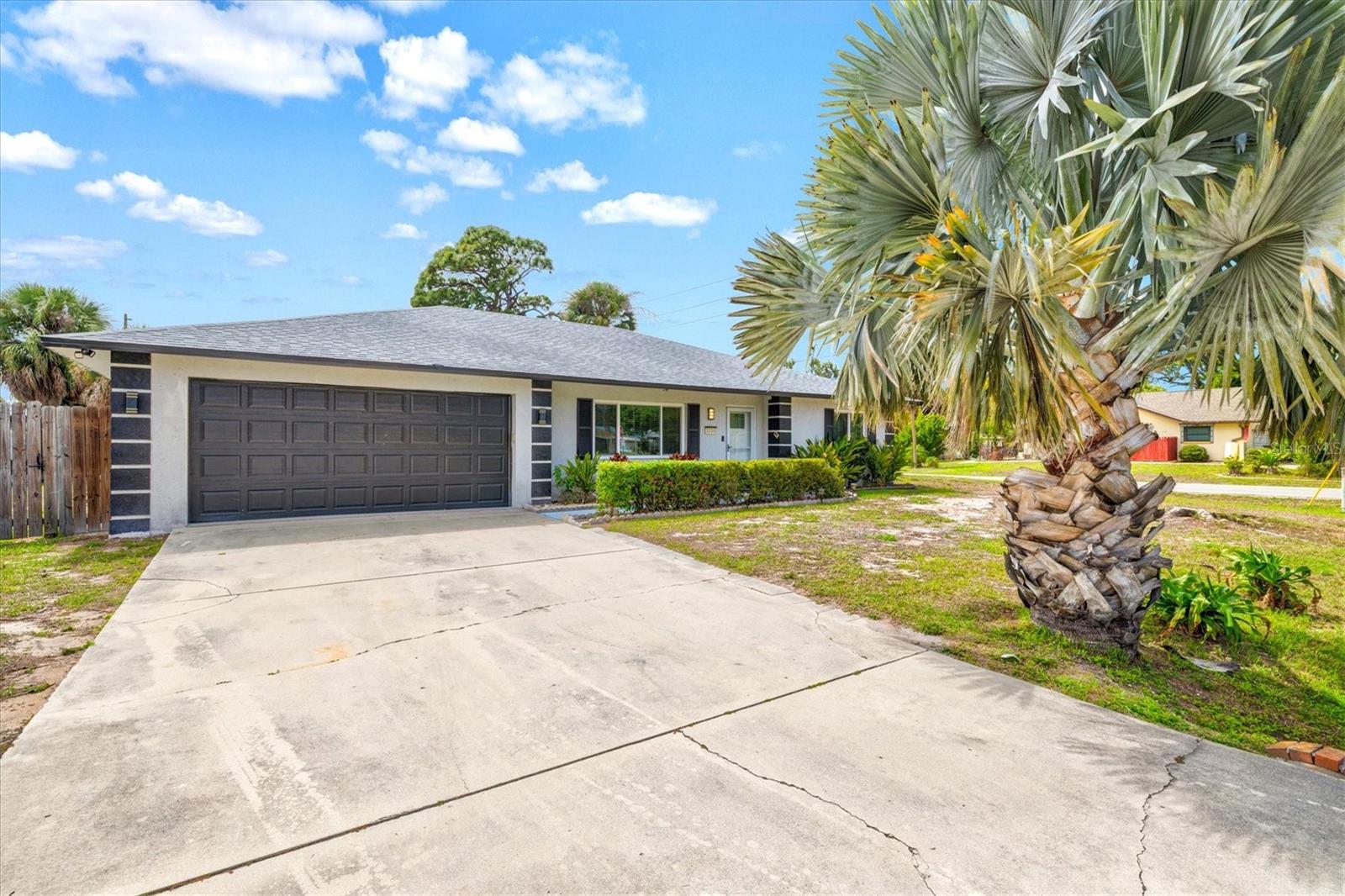 Welcome to this stunning fully furnished and completely renovated 3 bedroom, 2 bathroom POOL home with a 2 car garage, ideally situated on a spacious 0.27 acre corner lot. Stepping inside, luxury vinyl plank flooring flows throughout this split bedroom floorplan home, creating a seamless and modern feel. The living room features a stylish accent wall that serves as a striking focal point, adding character and warmth to the space. The updated kitchen offers a clean, modern design with ample cabinetry and functionality, perfectly suited for both everyday living and entertaining. Step outside to a fully fenced backyard designed for enjoying the Florida lifestyle. The in-ground pool with a screened enclosure creates the perfect private retreat for relaxing or hosting guests year-round. Located in South Venice with no HOA or CDD restrictions, this home offers both flexibility and convenience. Just minutes away, you’ll find Venice Beach, Sharky’s on the Pier, historic downtown Venice, shopping, dining, medical facilities, and top-rated schools. South Venice is known for its laid-back coastal lifestyle and outdoor amenities. Optional membership provides access to the South Venice Ferry, offering a private ride across the Intracoastal to a quieter stretch of Gulf beach. Nearby Shamrock Park & Nature Center, the Legacy Trail, and the Venetian Waterway offer miles of scenic trails for biking, walking, and running, while nearby boat ramps and kayak launches make it easy to enjoy life on the water. This home truly delivers the perfect blend of comfort, style, and location, schedule your showing today!