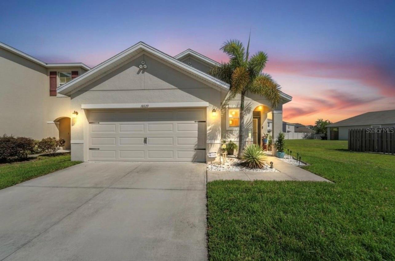Enjoy the Best of Florida living in this 3-bedroom, 2-bath Smart Home built by DR Horton with 1,516 sq ft, located in the highly desirable lagoon community Southshore Bay. As you enter, you are greeted by a versatile flex space with beautiful vinyl plank floors, perfect for a home office, den, or formal dining area. The kitchen features recessed lighting, granite countertops with breakfast bar, a large farmhouse sink,  beautiful wood cabinets, stainless steel refrigerator, and a cozy breakfast nook for casual meals with ceramic tile floors. There is also a Reverse Osmosis System in the kitchen. It opens seamlessly to the main living area with beautiful laminate vinyl plank floors, where glass sliders lead to a screened-in lanai and extended patio, creating the perfect indoor-outdoor flow, fenced in for your privacy. The primary bedroom is tucked away in the back of the home with an en-suite featuring dual sinks and a walk in closet. This home features a brand-new roof (2025), electric water heater (2025), washer (2025), and the yard has new Sod (2026) adding value and convenience. The home also has a water softener system and hurricane shutters. Whether you’re relaxing at home or taking advantage of the community’s resort-style amenities, this property offers the perfect blend of comfort and lifestyle. The 5 ACRE CRYSTAL LAGOON offers many Activities such as Kayaks, Paddleboards, Water Slide, Bouncy Obstacle Course, Swim up Bar, Volleyball and Floating Cabanas. The Community Amenities consist of a Dog Park, Walking-Nature Trails, ULTRA-FI Internet, and Golf Cart Paths. There are also WEEKLY and HOLIDAY COMMUNITY EVENTS that the Whole Family can Enjoy. Vacation Where You Live!!! CABLE AND INTERNET ARE INCLUDED IN THE HOA FEE. Minutes to I75, Shopping such as Publix, Walmart, McDonalds, Wawa, China Chen, Subway etc (all are within steps from your front door), Entertainment, Beaches and more. At the Entrance of the Community you will find Wimauma Community Health Center Office and A new Plaza where you will find many treats from Dunkin Donuts, Kosher Kaddy, Nail Salon, Ice Cream Shop, Sushi, and more to come soon. There is a one-time Lagoon contribution fee of $2,150 and a one time HOA Capital contribution of $300.