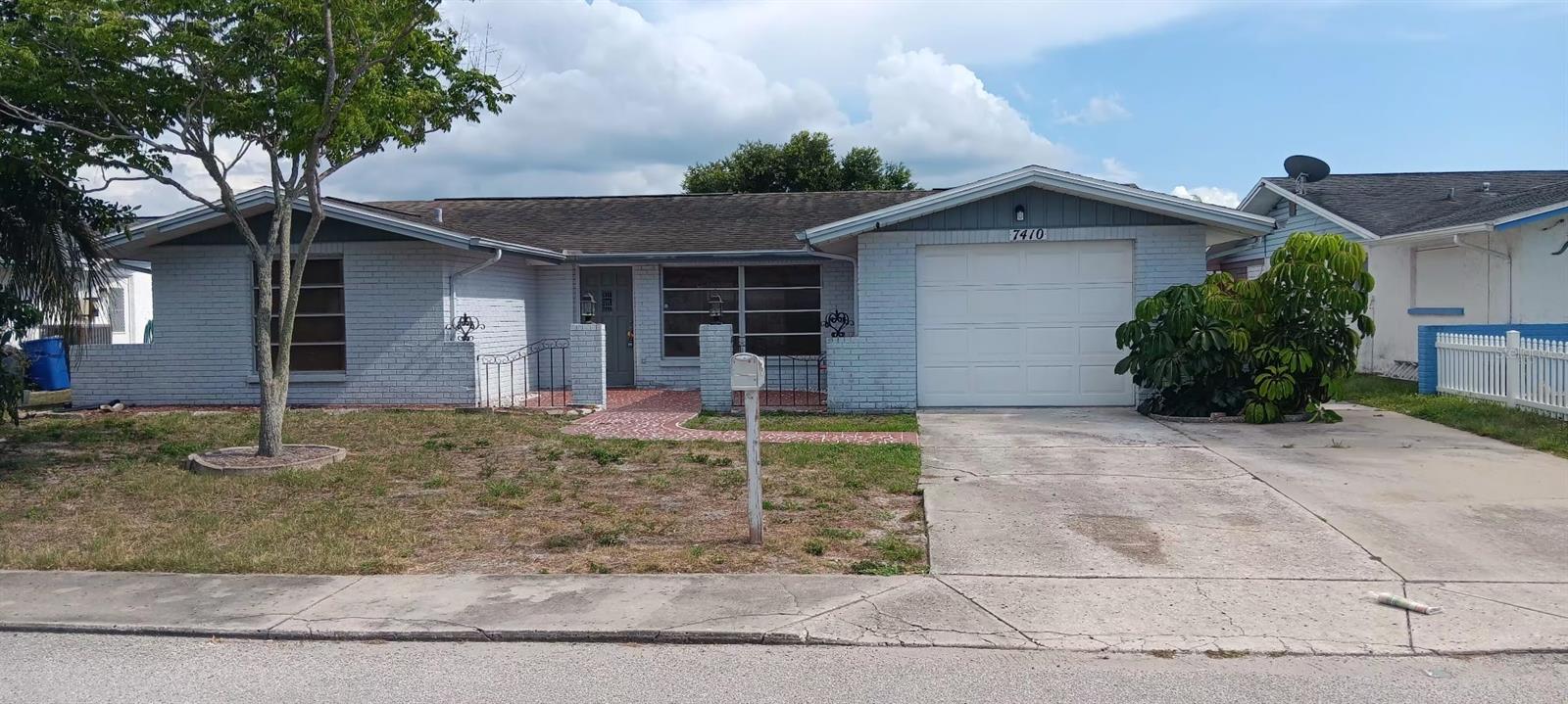 Wonderful 2 bedroom/2 bathroom updated home with a 1-car garage for rent in Port Richey, close to everything you need including the beach! Tile flooring throughout, NO CARPET. Central air conditioning, updated kitchen with granite countertops and a remodeled master bathroom. private backyard with a screen-enclosed lanai. No utilities included, REQUIREMENTS: First month's rent plus Security deposit of $1550 is required before move-in. 1 year min lease term. Applicants must have a credit score of 600 or more and monthly income of 4650. No smoking is permitted. Pets are allowed with landlord approval and $250 Non-refundable pet fee for each pet.