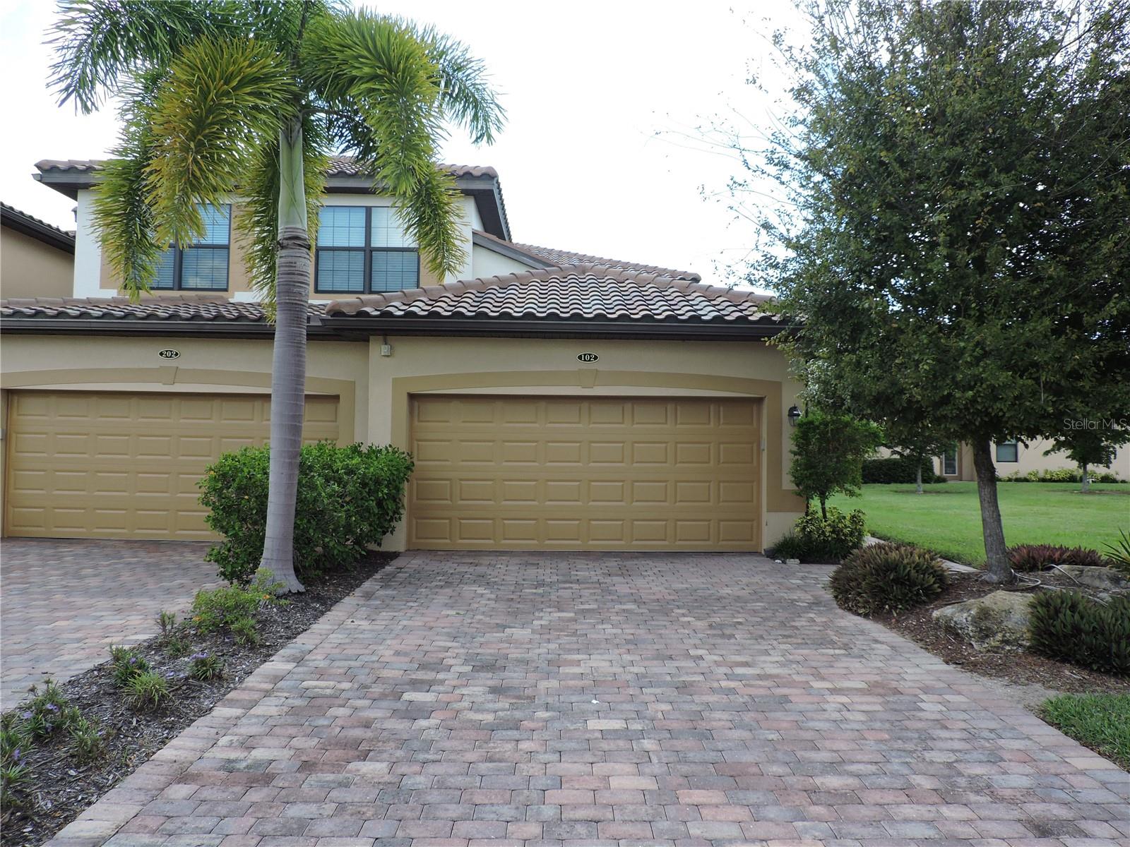 Being Sold Turnkey Furnished! Enjoy the good life at Gran Paradiso offering resort-style living in a beautifully designed, Tuscan-inspired community within the popular Wellen Park area. This furnished, three-bedroom maintenance-free Coach Home is move-in ready. This first-floor, end-unit Hibiscus floor plan features a great room open concept with a combined oversized living and dining room area. Open to the living area is a spacious kitchen with plenty of storage, stainless steel appliances, and stone countertops accommodating counter seating as well as a casual dining nook. Enjoy evening sunsets and expansive water views from the private screened lanai area. The generous master suite features his and her walk-in closets and a master bath with dual sinks, a soaking tub, and a separate large shower. Providing privacy and comfort for guests are two additional bedrooms and a second bathroom located on the opposite side of the home. The laundry room features a full-size washer and dryer and provides access to the attached two-car garage. Gran Paradiso offers its residents a wonderful lifestyle with rich amenities including heated free-form pool, spa, tennis courts, pickleball courts, fitness trails, game room with billiards and card tables, craft room, 24-hour fitness center, clubhouse locker rooms including sauna, steam room, and poolside cabanas. Gran Paradiso is just minutes from the Atlanta Braves Spring Training facility, the new Wellen Park Town Center as well as nearby beaches, golf courses, restaurants, and cultural events. With so much to enjoy, don’t miss this opportunity to call Gran Paradiso home!