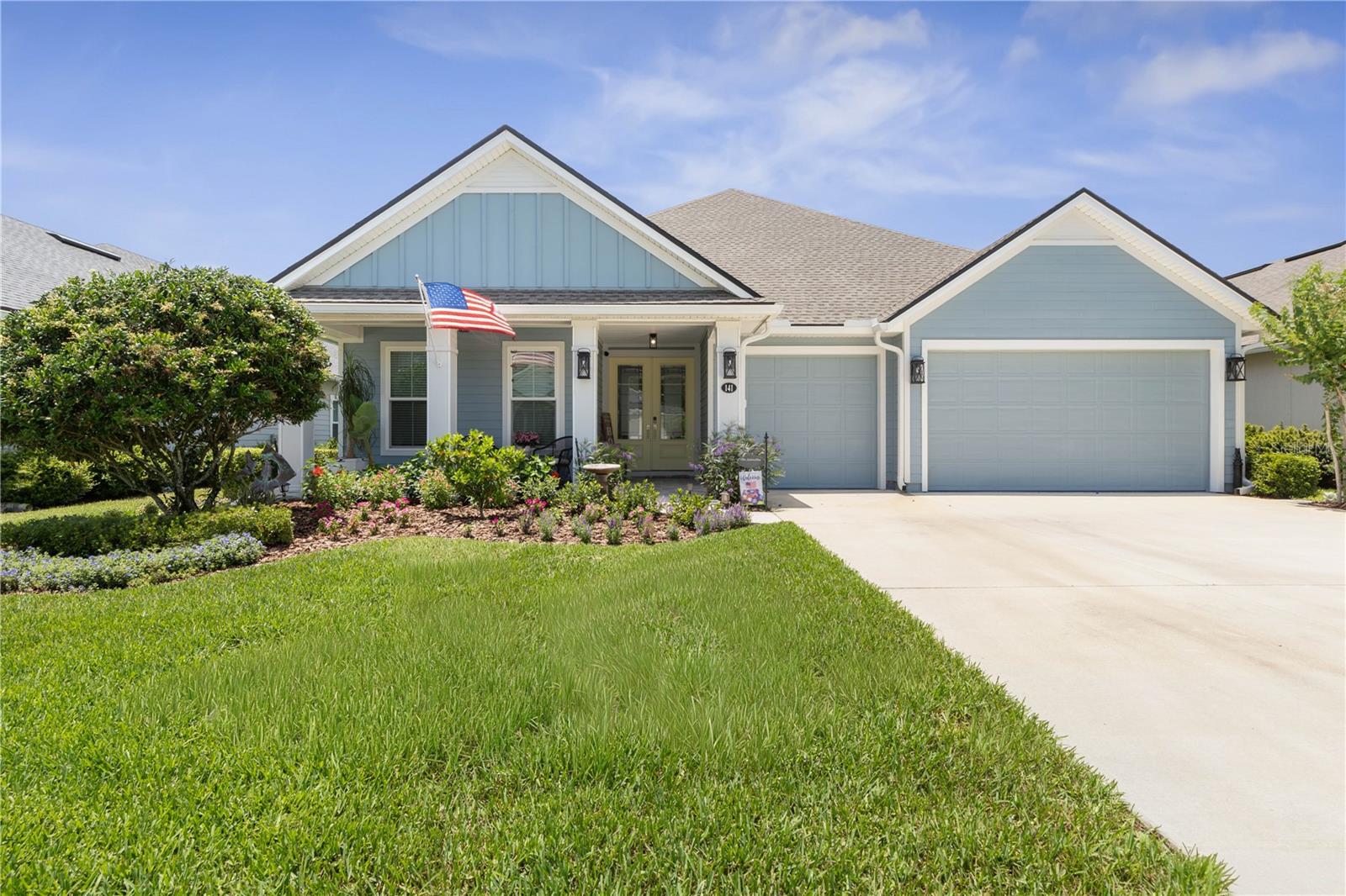 Lakeside Luxury Meets Modern Elegance in Grand Landings- Welcome home to a contemporary lakeside retreat in Palm Coast’s premier Grand Landings community! Built in 2022, this striking 4-bedroom, 3-bathroom home offers 2,490 square feet of meticulously maintained, light-filled luxury packed with high-end premium upgrades. The open floor plan features beautiful tile flooring and a chef’s kitchen boasting an upgraded cabinet package with crown molding, high-level quartz, and LED can lighting that extends into the bar area. The living room is anchored by a 72” Quorum fan with extra safety support. Modern updates continue with extra shelves in the primary closets, sleek glass enclosures in two baths, and added cabinets in the laundry room. Outside, a massive 3-car garage a car enthusiast's dream featuring premium Shark Coatings flooring, while the exterior is protected by seamless 6” gutters. For ultimate peace of mind, the main electrical panel is fully upgraded with a generator plug wired to power most of the house. Relax on your enclosed porch and screened lanai, designed for watching sunsets over the tranquil lake. Enjoy a resort lifestyle with low HOA fees, NO CDD fees, and full access to the community pool, clubhouse, dog park, and trails just minutes from dining, shopping, and Flagler Beach!