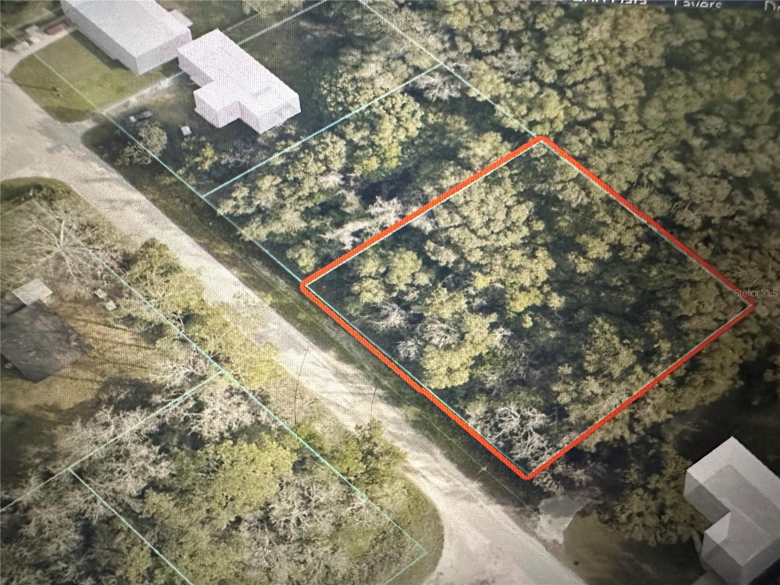 Great location to build your new home, this los is oversized and just shy of a half acre, it is on a paved road, and a corner lot, with privacy due to the road to the right of the lot being a dead end road. The lot location provides easy access to HWy 484, close to shopping, school, restaurants. Due to it's location, it has a quiet rural feel but close to everyday needs. Don't miss this great opportunity to build your dream home!