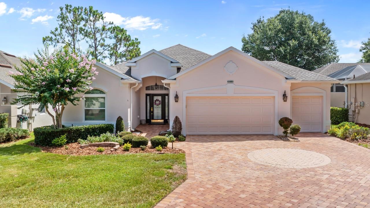 Welcome to your dream home in the highly desirable 55+ resort community of Kings Ridge! This exceptionally well-maintained 2-bedroom, 2-bath home with an office/den/study and 2 Car Garage with a golf cart garage offers the perfect blend of comfort, style, and peace of mind, all with spectacular golf course views. From the moment you arrive, you'll appreciate the pride of ownership and the extensive updates that make this home truly move-in ready. Major improvements include a 2025 roof, 2019 air conditioning system, 2021 water heater, and 2017 new energy efficient windows and sliding glass doors are just a few of the major items that will enhance the beauty of this home. Step inside to discover a bright, welcoming floor plan filled with natural light thanks to numerous solar tubes. The elegant living room, dining room, and office/den/study feature luxury plank vinyl flooring with 5 ¼ baseboards while ceramic tile flows through the kitchen, family room, and bathrooms. Plush newer carpeting creates a warm, comfortable retreat in the 2 bedrooms. The beautifully remodeled eat in kitchen is sure to impress any aspiring chef with updated wood cabinetry graced with crown molding, granite countertops, backsplash, and premium, high-end stainless steel Kitchen Aide appliances. The primary bedroom is spacious primary bedroom ensuite is painted in soft neutral colors and hosts a large walk-in closet.  The 2nd bedroom is strategically placed at the other end of the home and boasts a large closet and plantation shutters. The primary bathroom is fully renovated and boasts a large, impressive wood cabinet, double sinks, tiled jacuzzi tub and tiled walk-in shower.  The 2nd remolded bathroom is equally impressive with new sink and tiled walk-in shower. Additional features you'll appreciate include Spacious 2½-golf cart garage with wash tub. Attic exhaust fan for improved energy efficiency. Ceiling fans in the bedrooms, office, and family room. New lanai screening. Expansive screened lanai overlooking the golf course—perfect for relaxing with your morning coffee or enjoying beautiful Florida sunsets. Whether you're entertaining friends, enjoying the active Kings Ridge lifestyle, or simply taking in the peaceful golf course setting, this home offers everything you've been looking for. Don't miss this exceptional opportunity to own one of Kings Ridge's finest homes. Schedule your private showing today and discover why so many love calling Kings Ridge home!  Kings Ridge enhances easy shopping by driving your golf cart to Publix, Restaurants, Salons, Pet Supply and Groomer, Liquor Store, Banking, Gas Station, Pizza, and Ice Cream! Discover the epitome of comfortable active lifestyle living in Kings Ridge. Kings Ridge boasts 2 Golf Courses, 3 Pools, Hot/Cold Tubs, Dry Saunas, Steam Rooms, 2 Gyms, Tennis Courts, Pickleball Courts, Bocca Ball & Shuffleboard, and Basketball Courts. The Multi-Million Dollar Club House, is the heart of activities with Entertainment, Dances, Social Events, Games, Travel Clubs, etc. The monthly maintenance fees include lawn care, home phone, maintenance and trimming of shrubs, irrigation and replacement of sprinkler heads, basic cable TV and internet, and road maintenance, and exterior painting every seven years. WELCOME TO A WELCOMING HAVEN CALLED HOME!