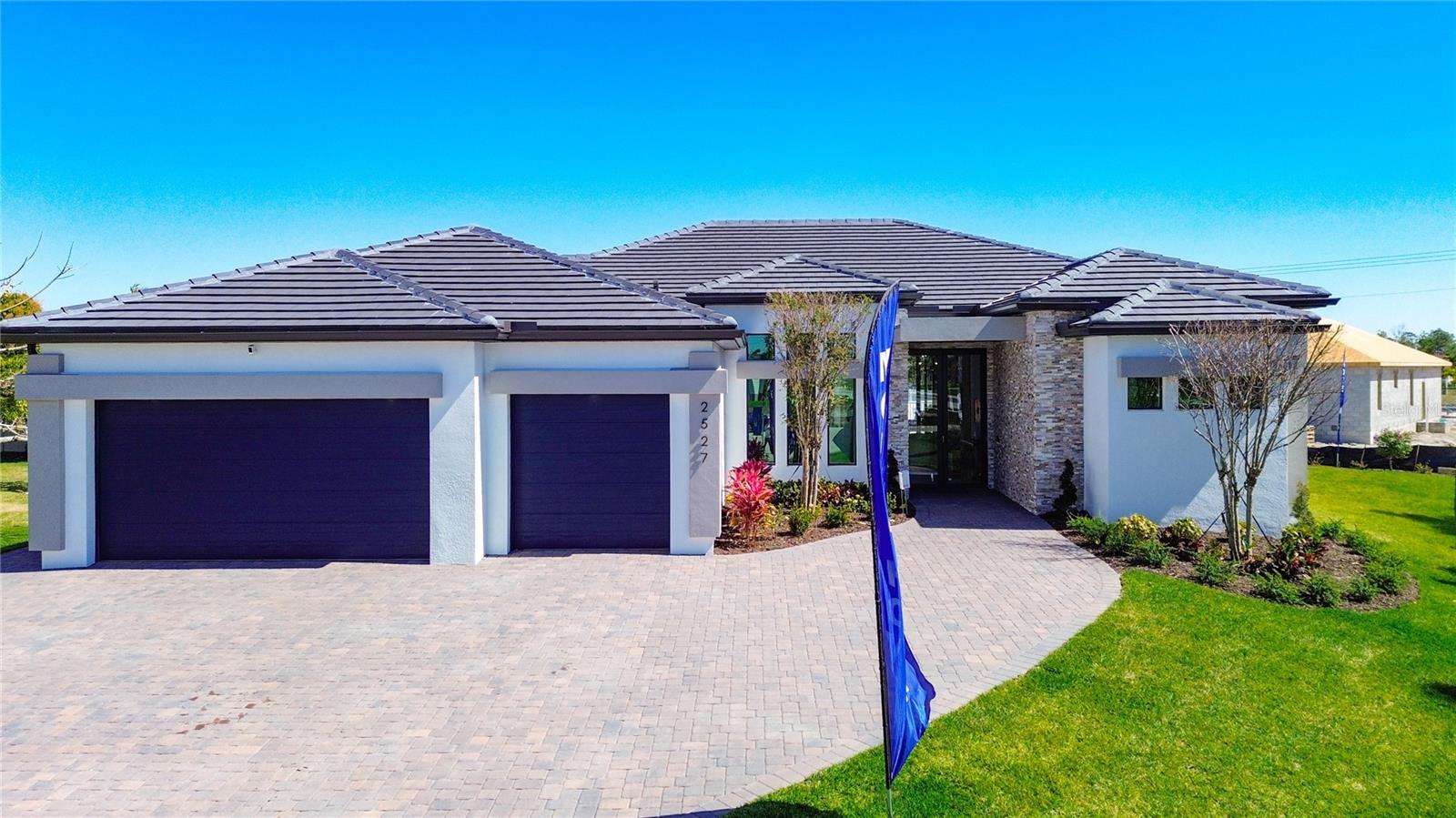This luxury model home provides over 2,600 SQFT of living space and 3,600 sq.ft. under roof in a cul-de-sac neighborhood! It includes 4 large bedrooms w/ walk-in closets, an office, 3 full bathrooms, 3-car garage!! 
Home comes FULLY FURNISHED! 
The home is filled with beautiful features and upgrades that make it one-of-a-kind!  HURRICANE IMPACT WINDOWS & DOORS!  The open floor plan features 7 trey ceilings up to 14.5' high, creating that one-of-a-kind ambiance. The gourmet kitchen boasts a 12-ft island & the dining room/living room flow seamlessly together, making it an incredible space for hosting your guests!! The large 90-degree, 10 ft. sliding glass pocket doors join the living room/dining room & lanai for breathtaking pool views. The master suite is picture-perfect with its private deluxe master bathroom with a soaking tub & a HUGE oversized closet!! The in-law suite has a private bath & linen for its guests. The large office features double French doors.  And remember that the 3-car garage provides ample space & storage up to 10' ceilings.  An infinity POOL and SPA to enjoy the day in the sun!  This home is thoughtfully conceived floor plan with plenty of architectural appeal, perfect for comfort & convenience. It is a home where dreams are formed!  Interested in moving to Florida but need a little time? Builder would be interested in a one-year leaseback! 

Bahnam Builders has floor plans available, or you can custom design your FOREVER HOME & build on your lot or ours!   Inventory available!