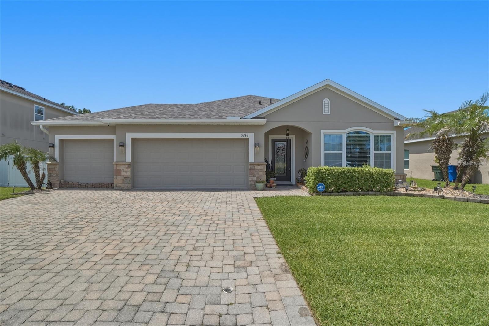 Welcome to this beautifully maintained 4-bedroom, 2-bathroom home with a 3-car garage located in the highly desirable Briarwood Estates community in St. Cloud, Florida. Featuring nearly 2,000 square feet of thoughtfully designed living space, this move-in-ready home combines modern upgrades, spacious living areas, and exceptional curb appeal.

From the moment you arrive, you'll appreciate the attractive paver driveway, manicured landscaping, and inviting front elevation. Inside, the open-concept floor plan creates a bright and airy atmosphere, perfect for both everyday living and entertaining. The spacious kitchen overlooks the main living area and features quartz countertops, abundant cabinetry, stainless steel appliances, a breakfast bar, and ample workspace for cooking and gathering.

The owner's suite provides a private retreat with a spacious bedroom, walk-in closet, and an updated en-suite bathroom featuring quartz countertops. Three additional bedrooms provide flexibility for family, guests, a home office, or hobby space.

Major updates provide peace of mind, including a NEW ROOF (2026) and a whole-home water softener system. The home's functional split-bedroom layout, generous living spaces, and modern finishes make it ideal for a variety of lifestyles.

Step outside and enjoy the backyard with plenty of room to relax, entertain, garden, or create your own outdoor oasis while enjoying Florida's year-round sunshine.

Conveniently located near top-rated schools, shopping, restaurants, medical facilities, Lake Nona, Orlando International Airport, and major highways, this home delivers the perfect combination of comfort, convenience, and value while placing you close to everything St. Cloud and Central Florida have to enjoy.