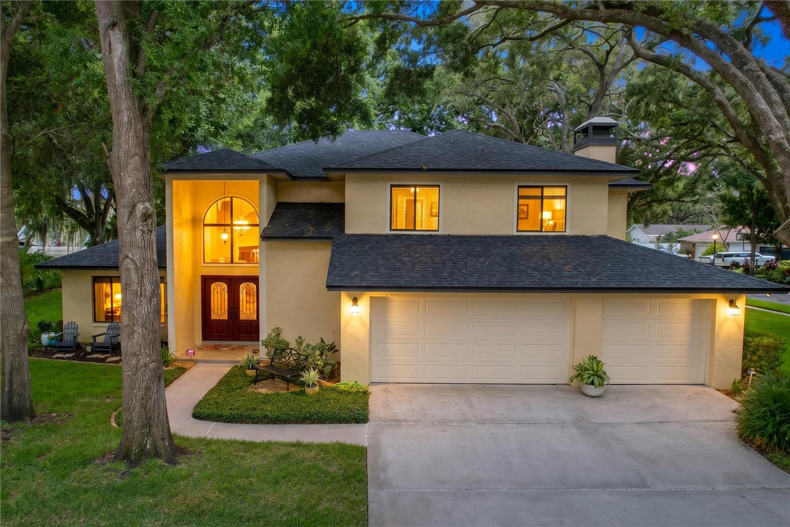 Amazing home and an amazing neighborhood. This a rare opportunity to have both!
Welcome to this executive home in Lake Magdalene Manors — and to a beautifully renovated, move-in-ready home in one of Tampa's most sought-after communities. Set on an oversized corner lot overlooking a peaceful pond, this exceptional property delivers tranquil waterfront views, inspired indoor–outdoor living, and a long list of modern upgrades that make it a truly exceptional find.
A dramatic two-story foyer and soaring vaulted ceilings set the tone from the moment you arrive. The heart of the home is an entertainment-ready kitchen and coffee/wet bar that flows seamlessly into the dining room and a roomy family room anchored by a cozy brick fireplace and sliding glass doors that open directly to the pool and lanai. Serious chefs will appreciate the thoughtful layout, gas range, and upscale Sub-Zero, Viking, and Bosch appliances.
The generous primary suite is your private retreat, featuring a surprisingly expansive wraparound walk-in closet and a spa-inspired bath with a large walk-in shower, garden tub, and generous vanity space. Spacious secondary bedrooms offer comfort and flexibility, while the loft provides versatility for a home office, fitness space, or creative retreat.
Step outside to a huge covered patio and screened lanai featuring a recently remodeled heated pool and deck with new interlocking fossilized pavers — your year-round setting for casual gatherings, game days, and relaxing weekends. The oversized yard offers abundant space for outdoor play and pets, and the pond beyond invites fishing and peaceful waterfront views right from your backyard.
Recent enhancements include a new roof, new pool finish, deck and heater, modern low-maintenance flooring throughout, updated cabinetry and baths, energy-efficient heating and cooling systems, and digital security, climate, and lighting controls. The 3-car garage adds brand-new performance flooring, workshop and storage space, and easy attic access.
Lake Magdalene Manors is one of Tampa's most beloved communities, with serene tree-lined streets and amenities including a private clubhouse, tennis and pickleball courts, and a playground — all with unrivaled convenience to top shopping, dining, schools, major sports venues, beaches, work hubs, and Tampa International Airport.
The space, lifestyle, quality construction, and truly carefree maintenance — with all-new mechanicals — that you've been searching for. It's all here.