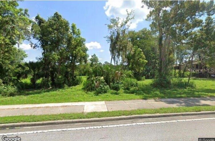Vacant buildable land. Suitable for townhouse, single family or can be refined for business.