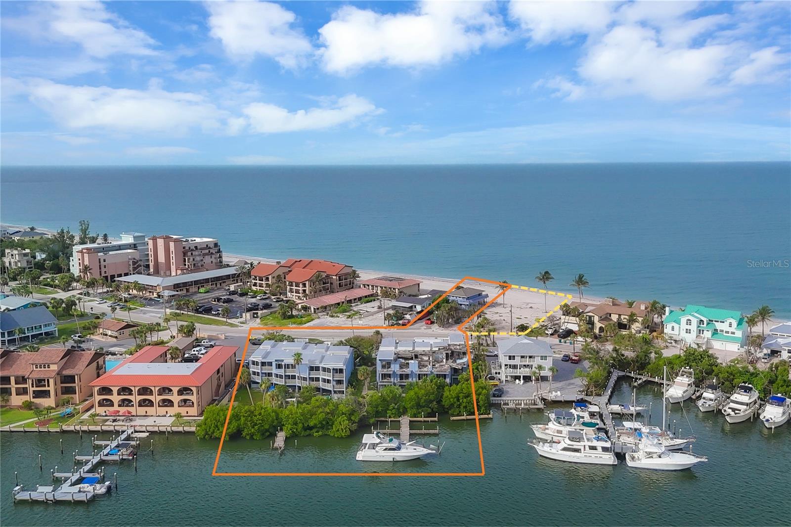 PRIME GULF AND BAY MULTIFAMILY PROPERTY ON MANASOTA KEY. Discover a rare opportunity to own a multifamily asset with unmatched waterfront exposure on both the Gulf of Mexico and Lemon Bay. The Englewood Beach and Yacht Club is being offered for sale as-is, presenting a unique investment opportunity for repositioning, redevelopment, or long-term hold. This multifamily property consists of a total of 8,700 rentable square feet situated on 1.282 acres of land. Originally operated as a timeshare resort, the property has recently undergone legal conversion to full fee-simple ownership, with a termination of all timeshare interests. Key Features: Direct beachfront access with beach on the Gulf of Mexico. Bay frontage with access to Lemon Bay and the Intracoastal Waterway with no bridges to open waters. Boat docks (currently in need of repair). Unit sizes averaging 791 SF, with two-story buildings offering coastal charm. Zoned MMF12. Important Notes: Property is being sold as-is with no warranties or guarantees on condition. One building (Bay Side) was heavily damaged by Hurricane Ian in 2022. Another building (Gulf Side) was heavily damaged by Hurricane Milton in 2024. Structural repairs may be needed to pass future milestone inspections. Repair cost estimates and survey are not provided by the seller. Buyer to conduct their own due diligence. Location Highlights: Located on Manasota Key, a serene and less-commercialized barrier island. Walking distance to area restaurants, shops, and Englewood Public Beach. Close proximity to mainland Englewood and SR-776. This is a compelling opportunity for those seeking Gulf and Bay frontage, development potential, or adaptive reuse in a rapidly appreciating coastal market.