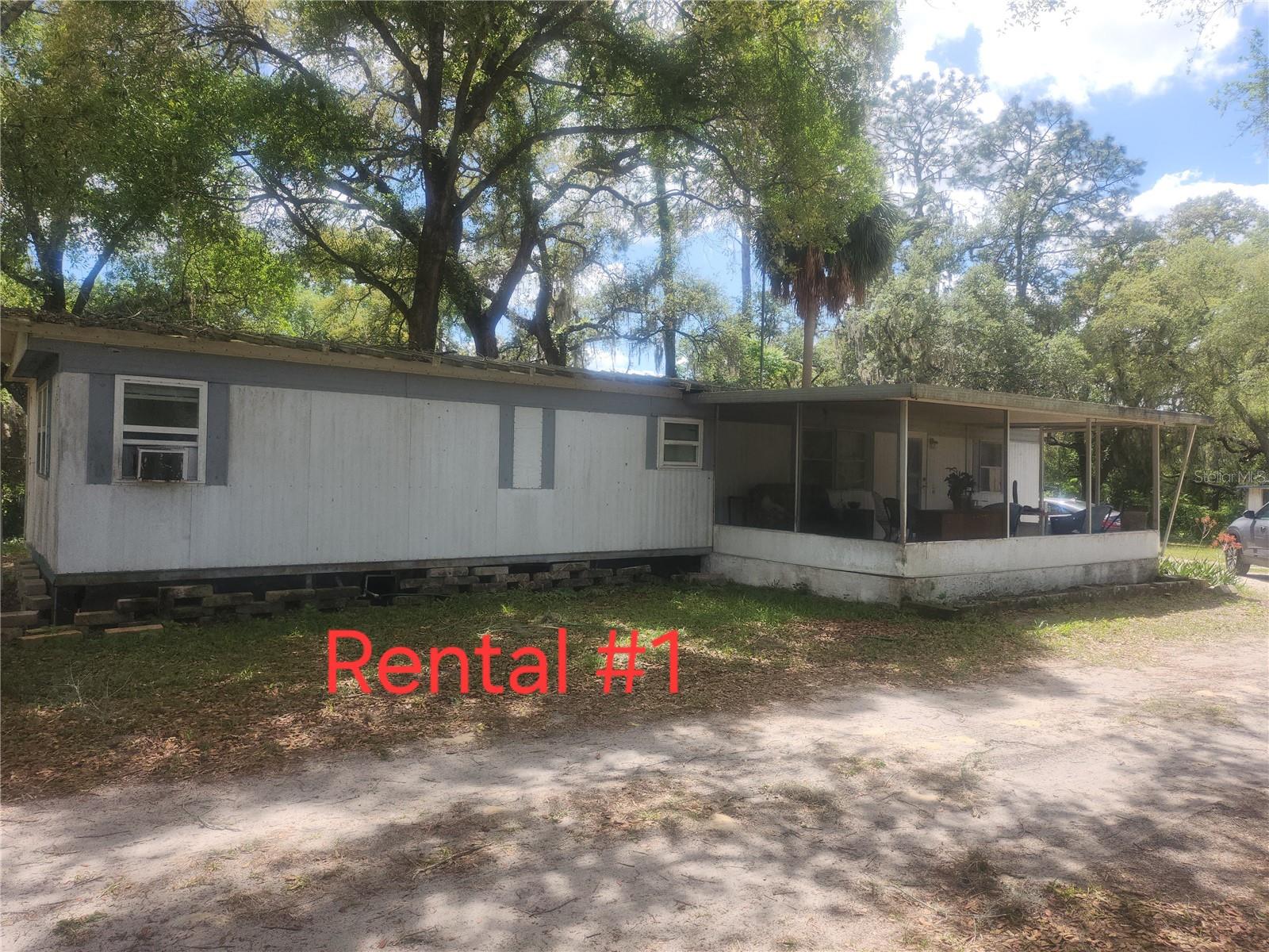 Super great investment property. Huge fenced corner lot. 1.26 acres, 2 homes, one built 1957 and the other built 1974. 1 structure is currently rented, the other one needs repairs. Must see. Lots of potential.