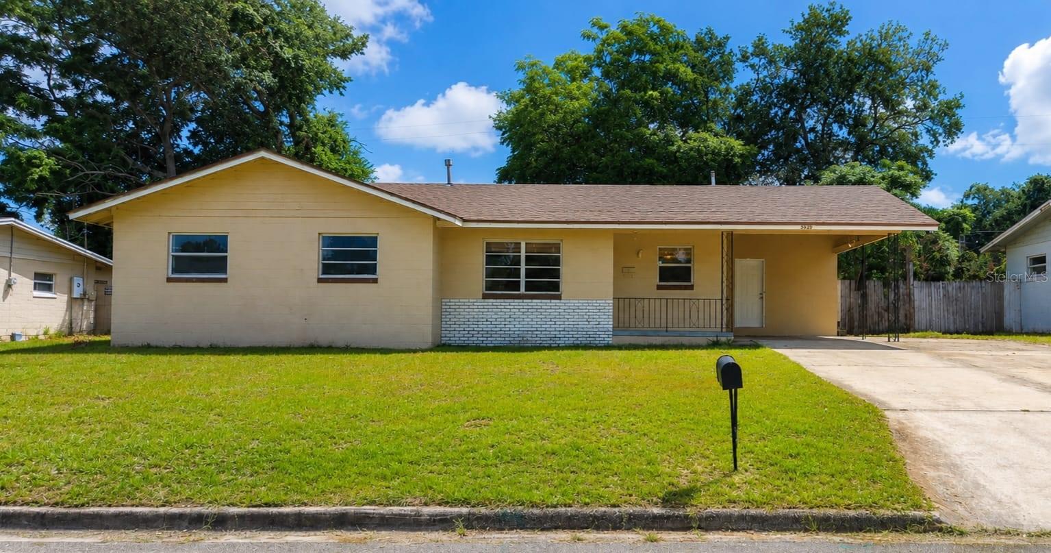 Virtually Staged. Spacious 5-bedroom, 2-bath pool home offering 1,531 square feet of living space on a generous lot  in an established neighborhood just minutes from Downtown Orlando with no HOA.

This functional floor plan offers plenty of space for comfortable living and the flexibility to fit a variety of lifestyles. The fifth bedroom provides exceptional versatility and can easily serve as a guest room, home office, family room, playroom, hobby space, or additional bedroom. The oversized covered carport offers convenient parking, while the dedicated exterior laundry/storage/workshop room provides valuable space for laundry, tools, hobbies, lawn equipment, and extra storage.

Step outside to your private backyard retreat featuring an in-ground swimming pool, covered lanai, and a separate fenced yard area, creating multiple outdoor living spaces for entertaining, relaxing, pets, gardening, recreation, or spending time with family and friends.

Major recent improvements provide added value and peace of mind, including a new roof (2025), HVAC system (2023), interior and exterior paint (2026), new interior flooring (2026), ceramic tile kitchen countertops (2025), kitchen appliances (2023), a resurfaced pool (2026), and upgraded pool equipment (2024) with a new pump, filter, and new plumbing and electrical connections.

Conveniently located near major highways, shopping, dining, hospitals, parks, schools, and entertainment, this home offers an outstanding combination of space, location, and everyday convenience.

Don't miss the opportunity to make this Orlando pool home yours. Schedule your private showing today!