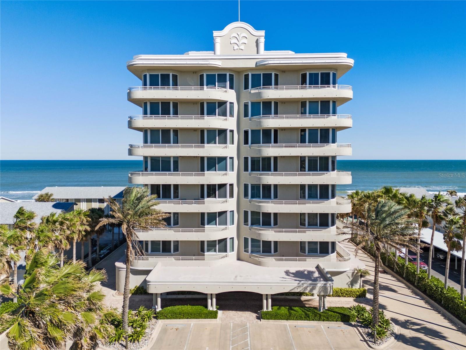 Welcome to the Fountains - the Jewel of New Smyrna Beach - and Your Private Oasis located on New Smyrna's No-Drive Beach. This exclusive  luxury, direct ocean front condominium features a gated entrance and secure lobby area with elevators that open to your private elevator lobby and Entry Foyer. Only two units per floor, very private! From the moment you enter Residence 3-S, you'll feel as if you've walked into a Chic Art Gallery. Spacious and Full of Natural Light, this is the Perfect Home for Entertaining. Soaring ceilings. Enormous living and dining area to entertain friends and family as you overlook the ocean. Enjoy the views and abundant natural lighting with floor to ceiling sliding glass doors and floor to ceiling windows from the Living room, Dining area and Family/Media room and Kitchen. Expansive bedrooms, each with private en-suite bath and walk in closets. 1400 +/- sq. ft. of balcony space. The Primary Suite enjoys fabulous ocean views, Ocean Front Balcony access and includes an enormous walk-in closet and an en-suite bath. The Primary Bath offers Ocean Views, Two separate vanities, Garden Tub, Large Walk-In Shower and Private Water Closet. Bedroom Two has dual balcony access, Southern light, expansive ocean views - making it the perfect artist's studio. Bedroom Three also enjoys Ocean Views and its own balcony access. Bedroom Four is also en-suite with sweeping Western Views. A Large (14' x 10') Lounge/Bar area is adjacent to the Entrance Hall, Kitchen and Dining area, and includes Granite counter tops, under-mounted bar sink and a wine cooler. The Kitchen has granite counter tops, glass cook top w/ a stainless "Zephyr" exhaust hood, wall ovens, breakfast bar, large island and open access to the adjacent Family/Media Room.  The large Laundry Room includes another stainless refrigerator, washer and dryer, stainless utility sink and built in cabinets. Two zoned AC units: One A/C Unit new in 2022. One A/C Unit new in 2024. The Mechanical/Utility room can be accessed through rear elevator for service access without coming through the residence. The Fountains has an emergency generator to provide full air conditioning, and power to specific areas, in the event of a power outage. Balconies have built-in drainage, electrical outlets and hose bib. Enjoy swimming in the zero-entry pool or play a set of tennis on a pristine Har-Tru clay court. Spectacular views from the roof top clubhouse and workout room. Private two car garage. Air conditioned, private storage unit. Private Beach Access - both by steps and by wheel chair accessible ramp. All measurements are approximate. Buyer responsible to verify all dimensions. PICTURES PAINT A THOUSAND WORDS - SO BE SURE TO CHECK OUT BOTH VIDEO TOURS AND THE PHOTOS!!