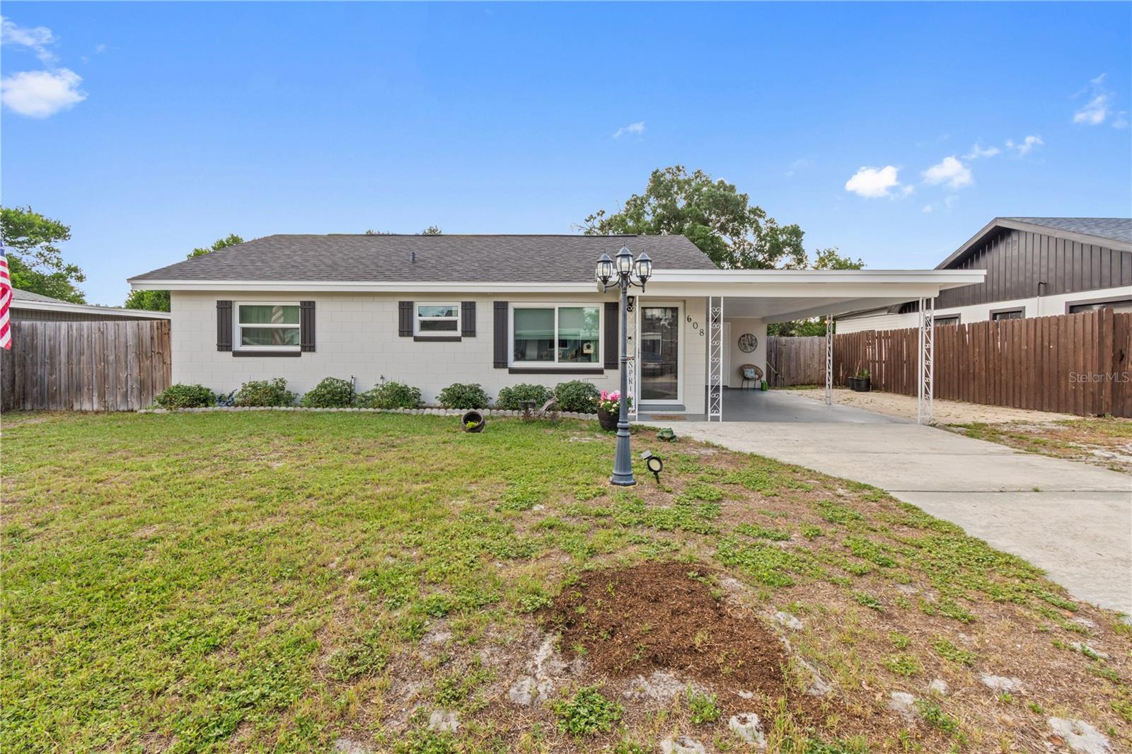 Welcome to this charming, updated 2-bedroom, 1-bathroom move-in ready home in the heart of Winter Haven! Enjoy ultimate peace of mind with a BRAND NEW 2026 ROOF, 2019 impact windows, a custom impact French sliding glass door, and a fresh 2026 exterior paint job. Step inside to an inviting open layout featuring sleek 2019 laminate flooring, matching modern kitchen cabinets, and premium 2019 Frigidaire appliances. The mechanicals are equally impressive with a 2020 AC unit boasting a brand new 2026 evaporator coil/fan motor, plus a highly efficient 2025 electric tankless water heater. The 2022 washer and dryer are included as well! Entertain with ease on the spacious screened-in back patio with updated 2021 screen doors, overlooking a fully fenced-in backyard. Complete with covered parking, an extra guest parking pad, and easy access to local dining, shopping, and the famous Chain of Lakes. Schedule your private tour today!