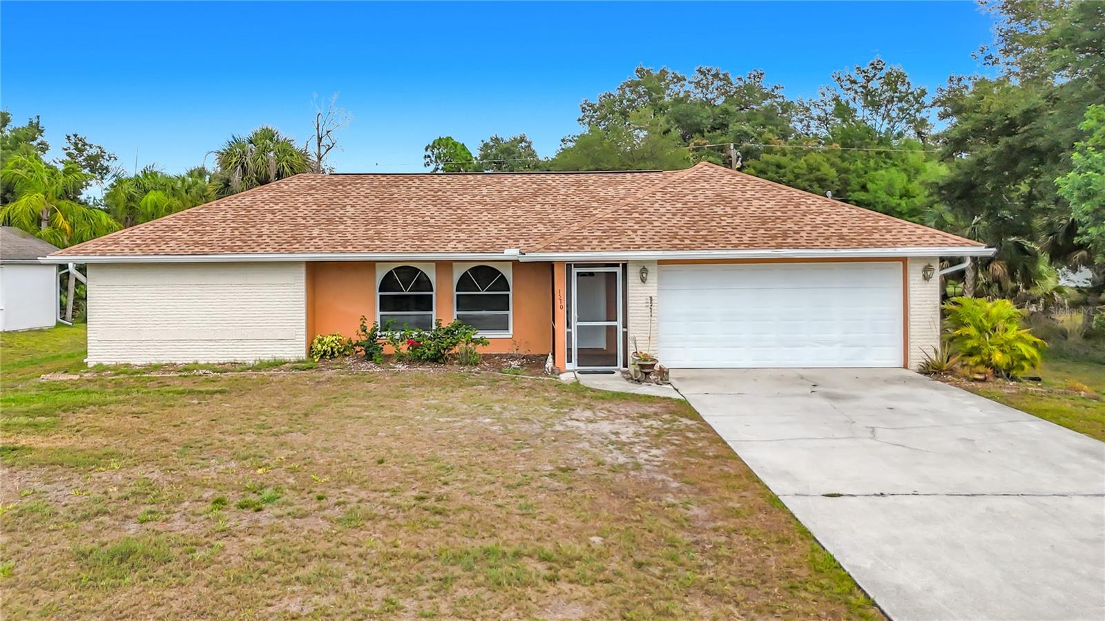 Welcome to this spacious 1,997 sq. ft. home in the heart of North Port, featuring soaring vaulted ceilings and a bright, open floor plan designed for comfortable Florida living. With generous living areas and an oversized Florida room, this home offers the perfect flex space for entertaining, a home office, fitness area, or additional family room.

The split-bedroom layout provides both functionality and privacy, while the expansive interior creates a warm and inviting atmosphere for everyday living or seasonal enjoyment. Enjoy added peace of mind with public water, NO HOA fees, and NO Flood Zone.

Conveniently located near shopping, dining, parks, and everyday amenities, this home is just 1 mile from Glenallen Elementary and only minutes from Warm Mineral Springs, Wellen Park, Atlanta Braves Spring Training at CoolToday Park, and Southwest Florida’s beautiful Gulf beaches. Offering the perfect combination of comfort, convenience, and lifestyle, this property is an excellent opportunity for a primary residence, seasonal retreat, or investment in one of Southwest Florida’s fastest-growing communities.