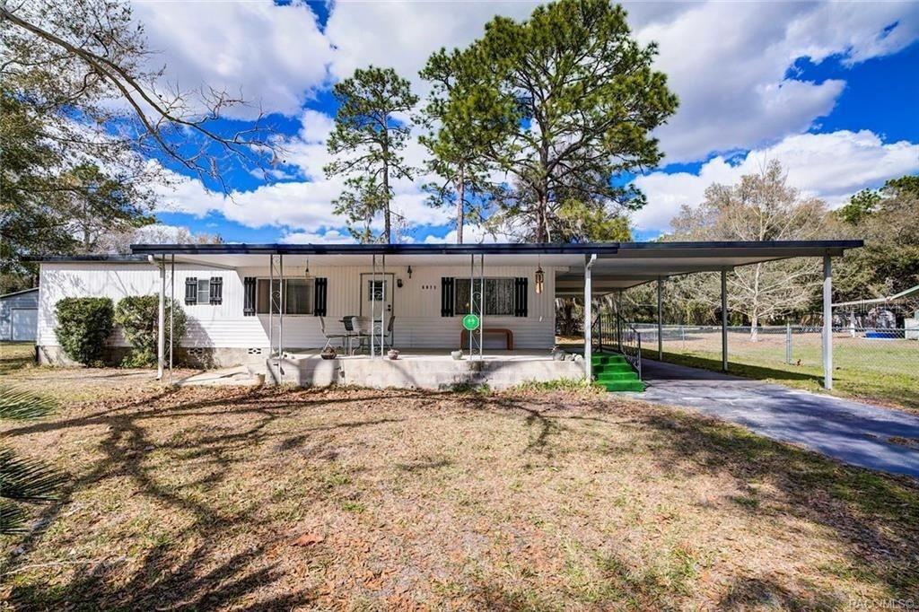 Best Buy in Homosassa!
Bring your cash and unlock the potential of this charming older mobile home situated on just over an acre of land. Clean, well cared for, and ready for its next chapter, this property offers a great opportunity for a buyer looking for affordable country living.
Enjoy the spacious lot with over an acre of land, a detached garage, and an additional carport. Recent updates include a newer well pump, newer A/C compressor, and newer septic tank, providing added value and peace of mind.
Whether you're looking for a winter retreat, investment opportunity, or a place to make your own, this property has plenty to offer. The Nature coast has world class recreation with freshwater Springs within minutes of this darling retreat.
No owner financing. Easy to show—schedule your tour today!