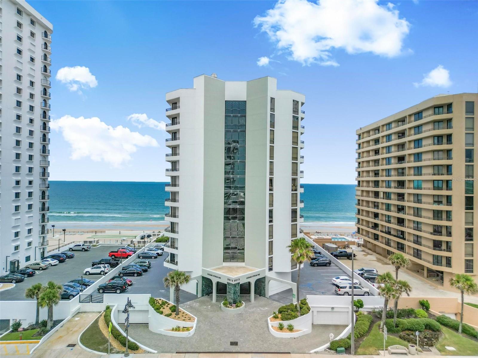 Enjoy effortless beachfront living in this beautifully maintained 2-bedroom, 2-bath oceanfront condo. The bright, open floor plan is filled with natural light and showcases ocean views from the main living areas and wraparound balcony. The updated kitchen features granite countertops, custom maple cabinetry, tiled backsplash, and a breakfast bar perfect for casual dining and entertaining. The convenience of in-unit laundry and ample storage adds to the home's appeal. Start your mornings with ocean breezes and sunrises from the east-facing balcony and unwind with colorful sunset views in the evening. Residents enjoy resort-style amenities including indoor and outdoor pools, spa, fitness center, social room, billiards room, underground parking, and additional storage. This turnkey oceanfront retreat is ideal as a primary residence, vacation getaway, or investment property . Schedule your private showing today!
