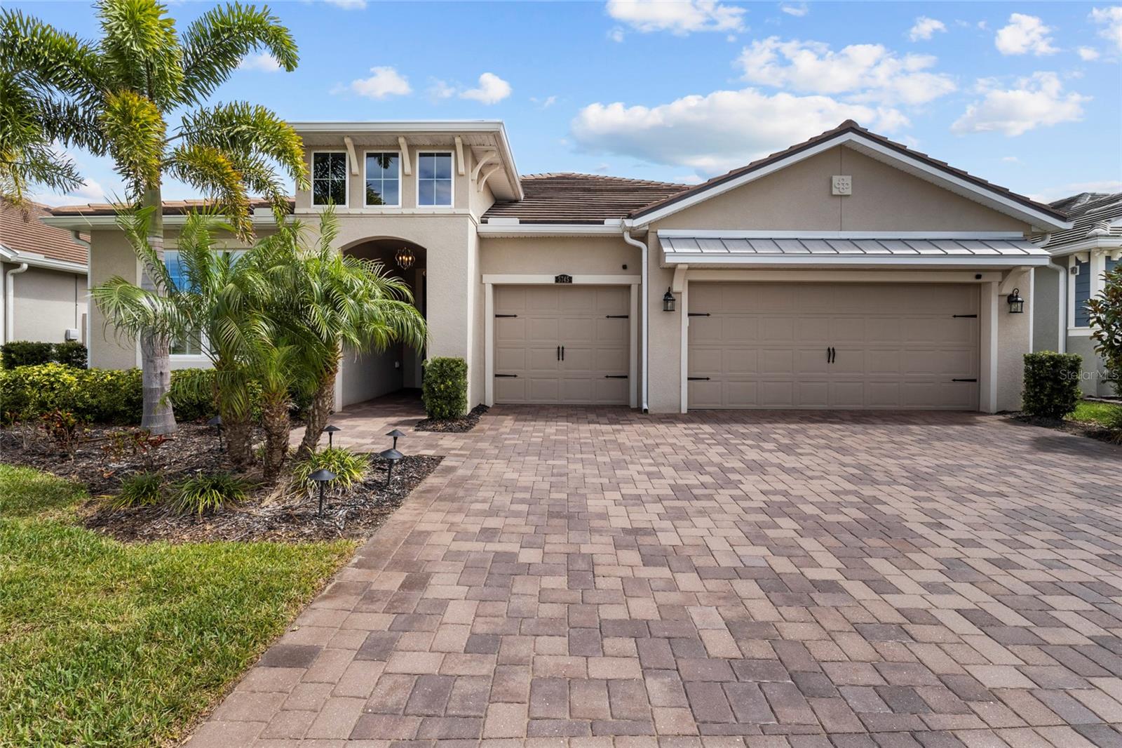 Price improvement! Welcome to this beautiful residence perfectly positioned on a PREMIUM lakefront lot within the gated community of Sunrise Preserve at Palmer Ranch. Built by Mattamy Homes in 2022, this property was designed for comfort, style, and effortless living and blends elegant finishes blend with peaceful water views that greet you from the moment you enter.
The open great room is filled with natural light and enhanced by graceful tray ceilings, creating a warm and inviting atmosphere. The modern kitchen flows seamlessly into the living and dining areas and features upgraded cabinetry along with a built-in wet bar, a large pantry, ideal for entertaining or everyday convenience. Throughout the main living spaces, tile flooring adds both beauty and practicality, while the bedrooms offer soft carpeting for comfort. Plantation shutters throughout the home bring timeless charm and a polished, cohesive look.
With 3 bedrooms plus a den, the layout adapts easily to your lifestyle—whether you need a home office, hobby room, or guest space. The primary suite offers calming lake views and generous walk-in closets. The laundry room includes upgraded cabinetry, adding valuable storage and function.
Step out to the screened lanai and enjoy the tranquil lake setting with an east-facing exposure that brings gentle morning light and comfortable afternoons. Practical features elevate this home even further: a convenient 3-car garage, whole-house GENERATOR, HURRICANE SHUTTERS, and a whole-home water FILTRATION and SOFTENER system for added comfort and peace of mind.
Sunrise Preserve is known for its true easy lifestyle. The HOA covers landscaping, irrigation, and pest control, allowing you to enjoy Florida living without the worry of exterior maintenance and resort-style amenities, including a clubhouse, a fitness center, pickleball and tennis courts, a resort-style pool, and a full-time lifestyle director.....
All of these just minutes from Legacy Trail, Siesta Key Beach, shopping, dining, and everything Sarasota has to offer. A perfect blend of luxury, comfort, and low-maintenance living — this home invites you to enjoy the best of Florida living.
Schedule your private showing today!
