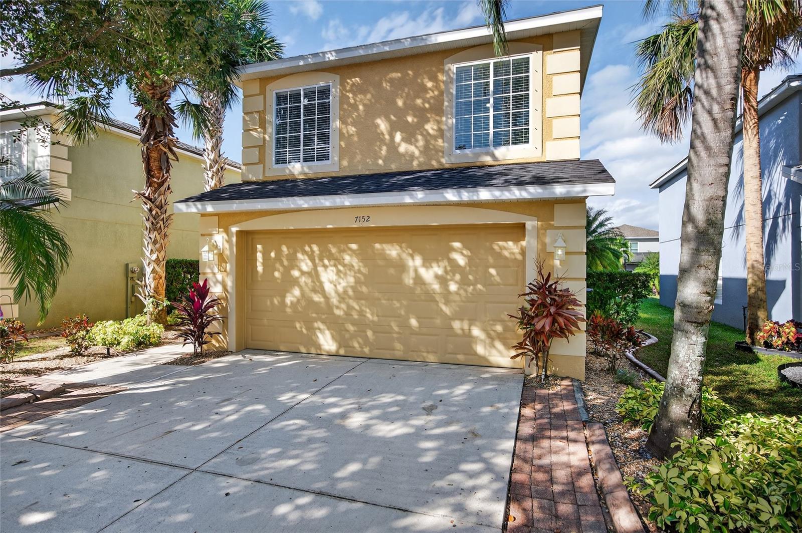 Virtually Staged. SOLAR PANELS PAID OFF! Very low electricity bill!! 

This spacious 4-bedroom, 2.5-bath home with a 2-car garage combines modern upgrades with serene Florida living. Enjoy peace of mind with major updates completed this year, including a BRAND NEW ROOF, NEW HVAC SYSTEM WITH NEW DUCTWORK, and FRESH PAINT INSIDE and OUTSIDE. The home also features energy-efficient solar panels installed in 2023, helping you save on utility costs. This property is also located in a **non-flood zone**, offering added security and lower insurance costs.

Step into the modern kitchen featuring granite countertops, stainless steel appliances, and a brand-new dishwasher. All bedrooms boast brand-new carpet, adding comfort and a fresh feel throughout. The primary bedroom offers a relaxing retreat with its en-suite bathroom featuring a custom, renovated shower and a soaking tub, along with a spacious walk-in closet. Upstairs also includes a versatile mezzanine area, perfect for a recreation room, home office, or study space.

Step outside to your own tropical paradise featuring meticulously maintained landscaping and a lush, living fence that provides exceptional backyard privacy with IRRIGATION SYSTEM. Relax and unwind on the SCREENED back patio overlooking your tranquil backyard oasis.

Inside, you’ll find washer and dryer, and window coverings—all included. Located in the desirable Lighthouse Cove at Heritage Harbour community, residents enjoy soccer fields, Little League baseball diamonds, a Frisbee golf course, and a newly renovated massive newly renovated playground. Golf enthusiasts will love the nearby Heritage Harbour Golf Course, and shopping is a breeze with Costco, a brand-new Target, and great restaurants just minutes away.

Move-in ready and meticulously cared for—this home truly has it all!