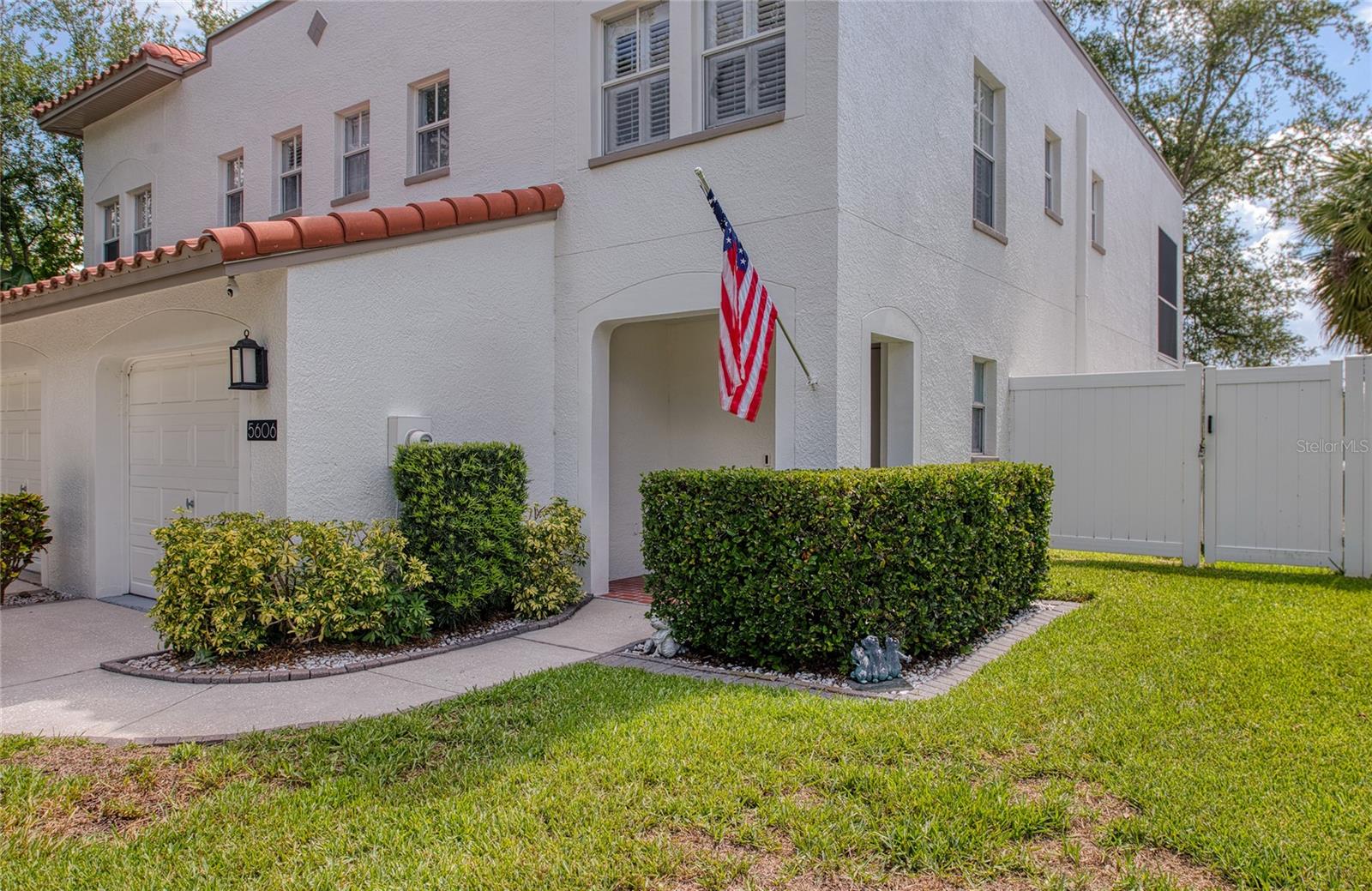 Welcome to your private oasis in the highly sought-after Leila Avenue Villas! Nestled within a beautiful, gated community of only 40 residences, this stunning townhome perfectly blends low-maintenance luxury with an unbeatable South Tampa location. Step inside to a bright, open-concept downstairs layout designed for seamless entertaining and effortless daily living. The fluid transition from the living spaces to the outdoors leads you to your own personal sanctuary, where you can enjoy a serene pond view complete with a relaxing swim spa—the ultimate spot to unwind after a long day.The upper level is thoughtfully designed for comfort and versatility, featuring two full bedrooms plus an adaptable bonus space. The peaceful primary suite offers a spacious walk-in closet, while the second bedroom is perfectly sized for family or guests.  Adjacent to the bedrooms, the flexible bonus room makes a perfect home office, nursery, or private retreat, and it opens up to its own private, screened-in balcony overlooking the tranquil water.This home is packed with premium extras, including an attached garage equipped with custom built-in storage solutions and a large, secure fire safe. Residents here enjoy complete peace of mind with low HOA fees and the significant financial savings of no flood insurance required. Steps from your door, you can also take advantage of the sparkling community pool.The location truly cannot be beaten, putting you minutes from everything Tampa Bay has to offer. You are just a short distance from the iconic sidewalks of Bayshore Boulevard, the vibrant energy of downtown Tampa, and the Tampa International Airport. Plus, you will have quick and easy highway access to the area's award-winning Gulf beaches. Don't miss this rare opportunity to own a piece of paradise in a quiet, exclusive community. Schedule your showing today!