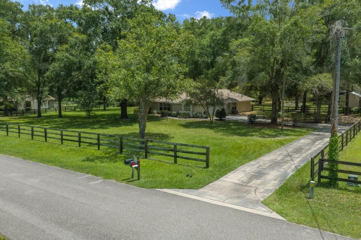 Welcome to your own private slice of Ocala! Nestled on 1.3 fully fenced acres, this beautifully maintained 3-bedroom, 2-bath pool home offers the perfect blend of comfort, functionality, and country living—just minutes from the World Equestrian Center (WEC).

Step inside to find a spacious split-bedroom floor plan featuring a generous primary suite with a huge walk-in closet and direct access to the outdoor living area. The home is designed for both everyday living and entertaining, with a sparkling pool enclosed by a brand-new birdcage and a convenient cabana bath, making pool days effortless.

Outside, the property is ready for hobbyists, horse lovers, or anyone needing extra space. Enjoy horse stalls, a 18’ x 12’ workshop/shed with electricity, and plenty of room for animals, gardening, or storing equipment. The fully fenced yard, with fencing approximately 3½ years old, provides privacy and security while allowing you to enjoy the peaceful surroundings.

Additional features and updates include:

Septic tank pumped a few months ago
New garage door
New dryer
Air conditioning system approximately 6–7 years old
Mature lemon tree

Whether you’re searching for a mini-farm, an equestrian-friendly property, or simply a home with room to spread out and enjoy Florida living, this property checks all the boxes. Conveniently located near shopping, dining, medical facilities, and the World Equestrian Center, you’ll enjoy the tranquility of country living without sacrificing convenience.

Don’t miss this exceptional opportunity to own a move-in-ready pool home with acreage in one of Ocala’s most desirable locations!