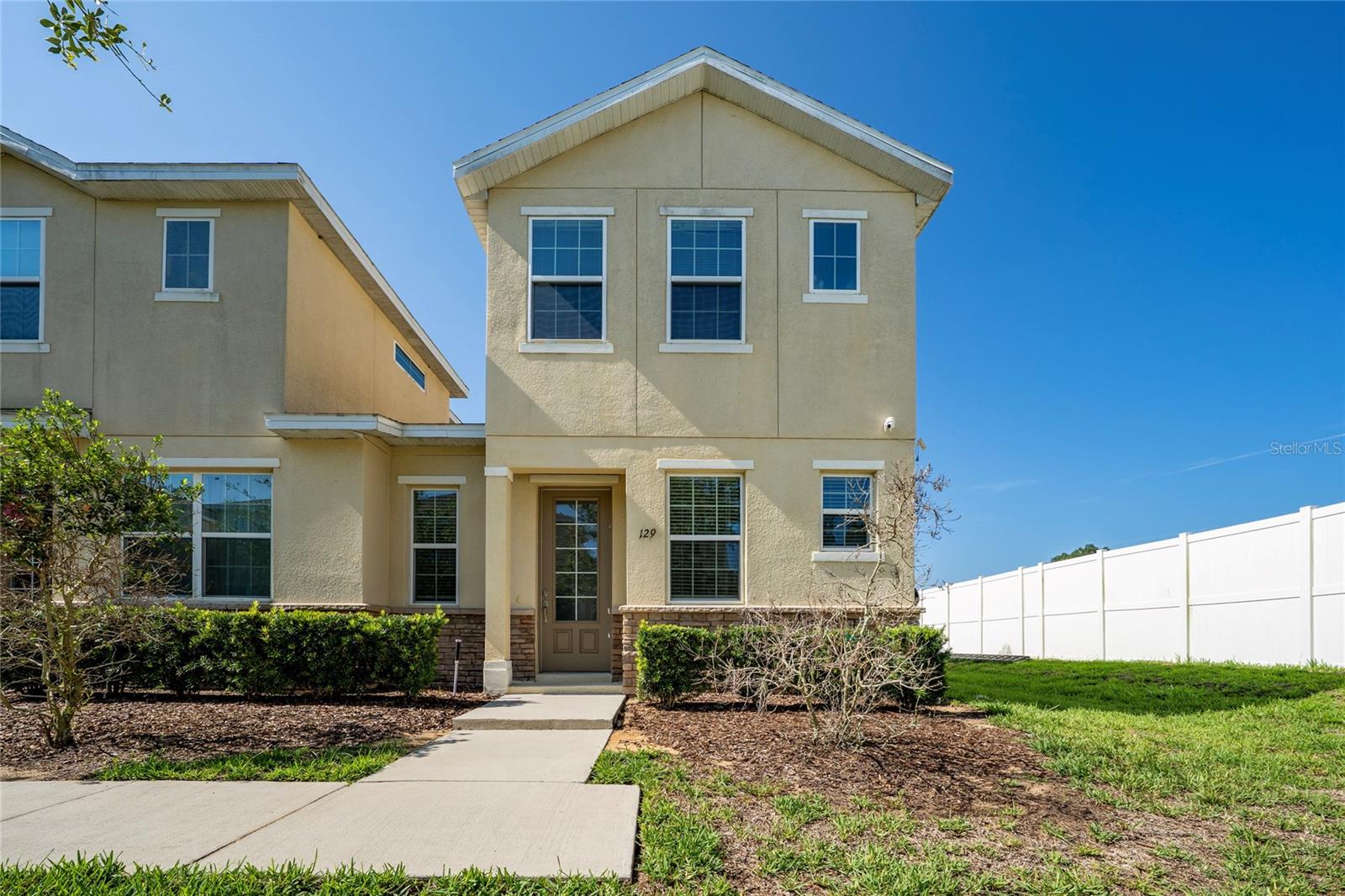 Welcome to this beautifully maintained 3-bedroom, 2.5-bath corner-unit townhouse in the desirable Hollygrove Village community in Davenport. Proudly owned by only one owner, this home has been exceptionally cared for and is in excellent condition, making it truly move-in ready.

The thoughtfully designed floor plan offers spacious living areas filled with natural light, an open-concept layout ideal for everyday living and entertaining, and generously sized bedrooms. The primary suite provides a comfortable retreat with an en-suite bathroom and ample closet space. A convenient half bath is located on the first floor for guests.

One of the standout features of this home is the attached one-car garage, offering plenty of room for parking and additional storage. As a corner unit, you'll also enjoy added privacy, extra windows, and an abundance of natural light throughout the home.

Ideally located in one of Central Florida's fastest-growing areas, Hollygrove Village offers convenient access to US-27, I-4, and Highway 17-92, making commuting to Orlando, Walt Disney World, ChampionsGate, and surrounding areas quick and easy. You'll also be just minutes from Posner Park, shopping, restaurants, medical facilities, golf courses, schools, and a variety of entertainment options.

Whether you're a first-time homebuyer, looking to downsize, or searching for an investment property, this meticulously maintained townhouse is an outstanding opportunity. Schedule your private showing today!